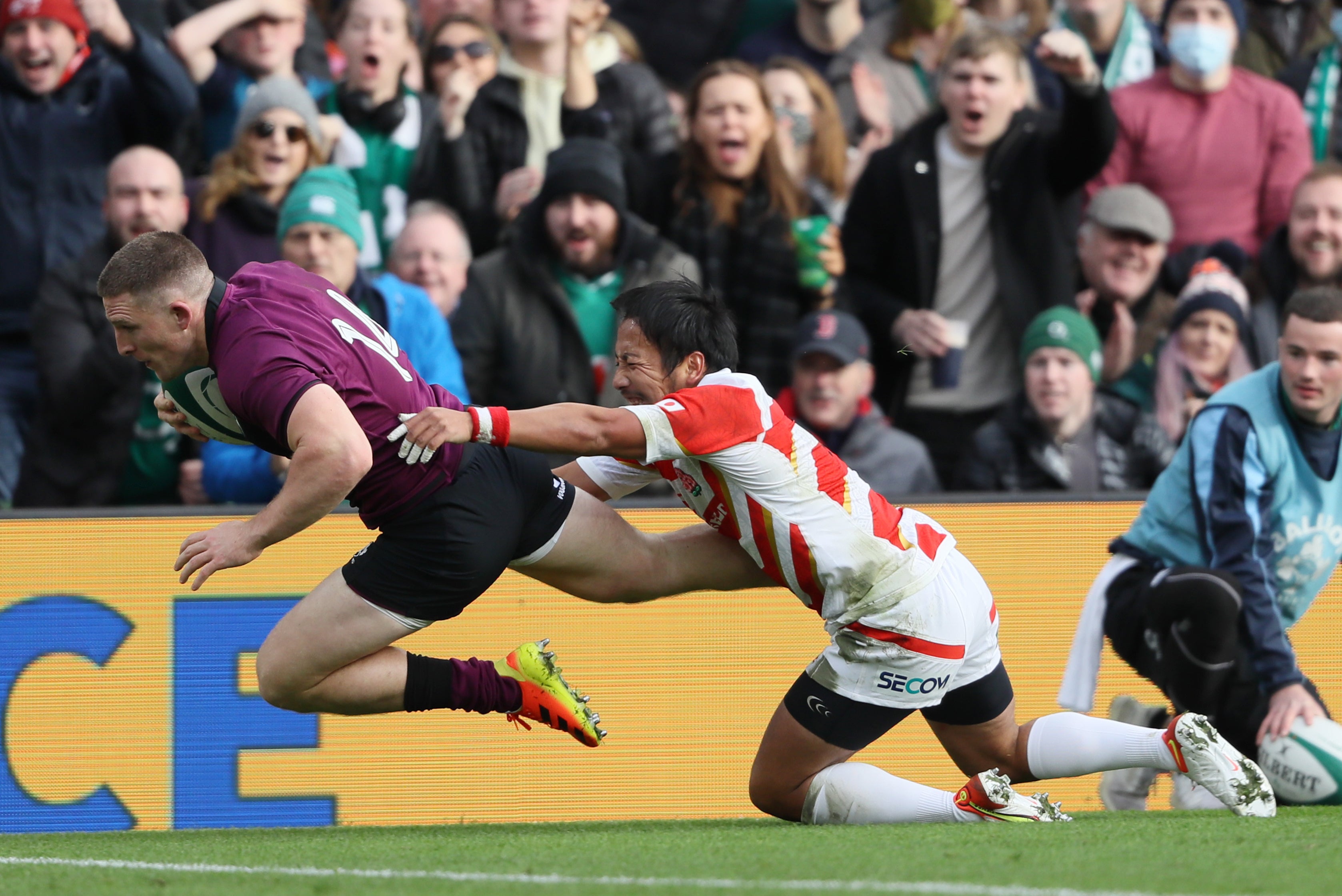 Ireland wing Andrew Conway, left, scored a hat-trick against Japan (Brian Lawless/PA)