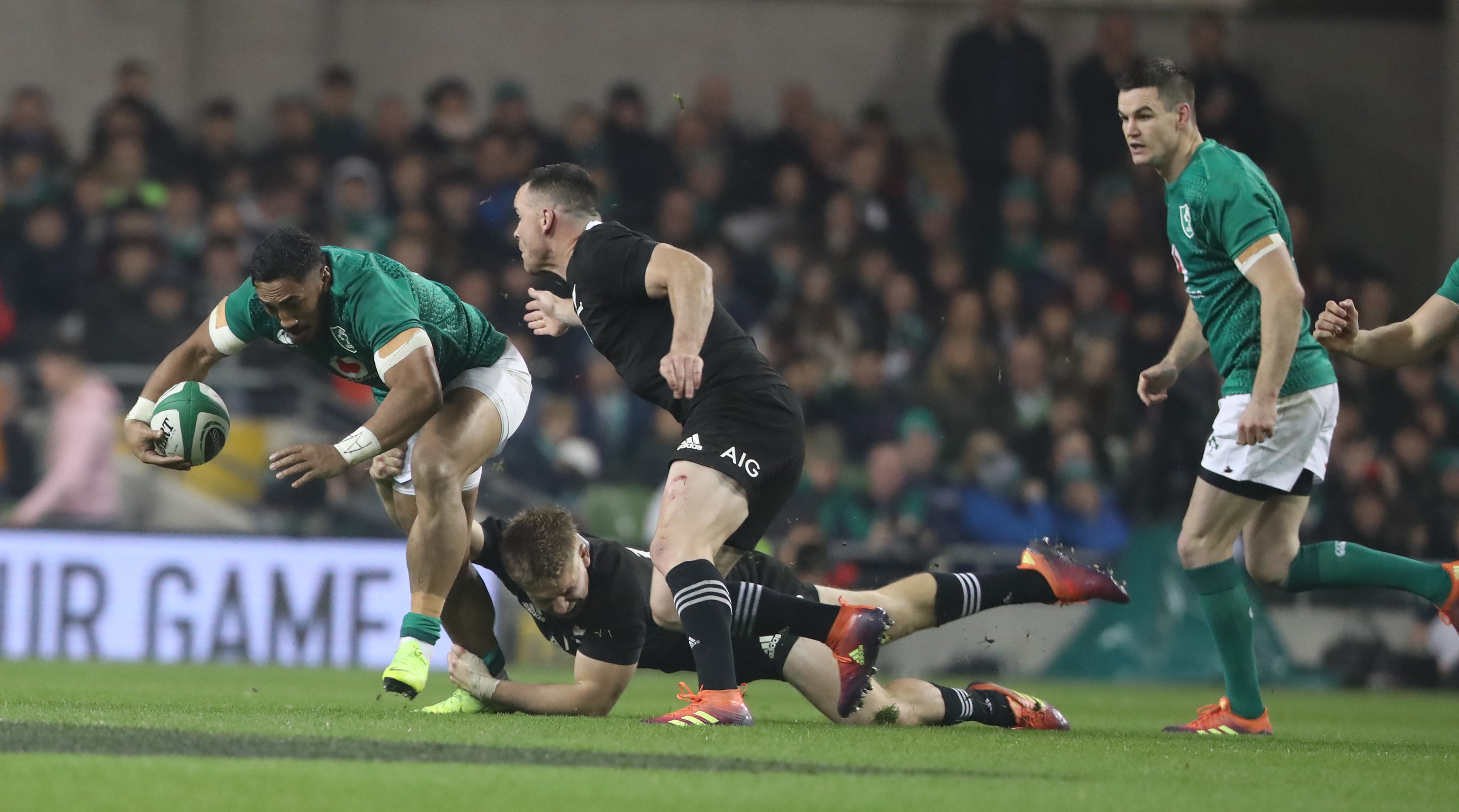 Bundee Aki, left, helped Ireland beat New Zealand in 2018 (Niall Carson/PA)