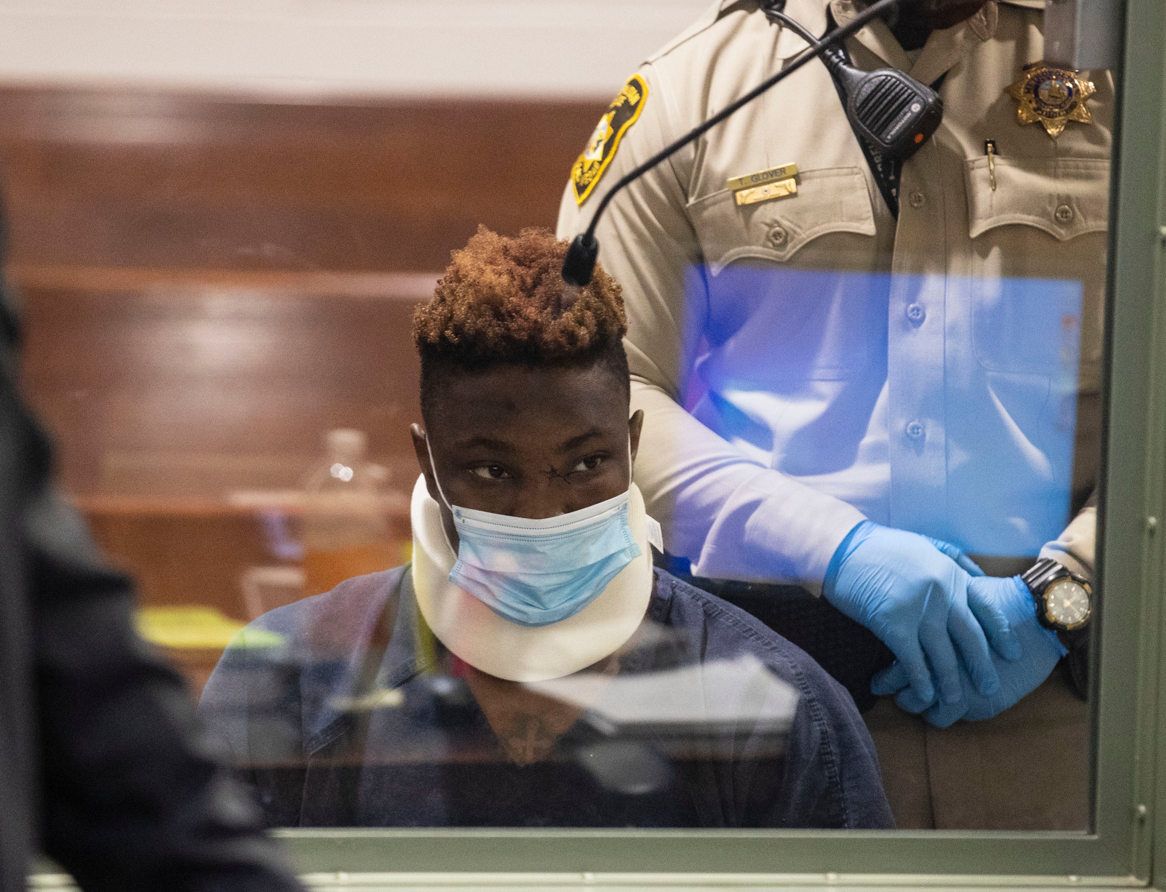 Former Raiders wide receiver Henry Ruggs, accused of DUI resulting in death, appears in court during his initial arraignment at the Regional Justice Center, on Wednesday, Nov. 3, 2021, in Las Vegas.