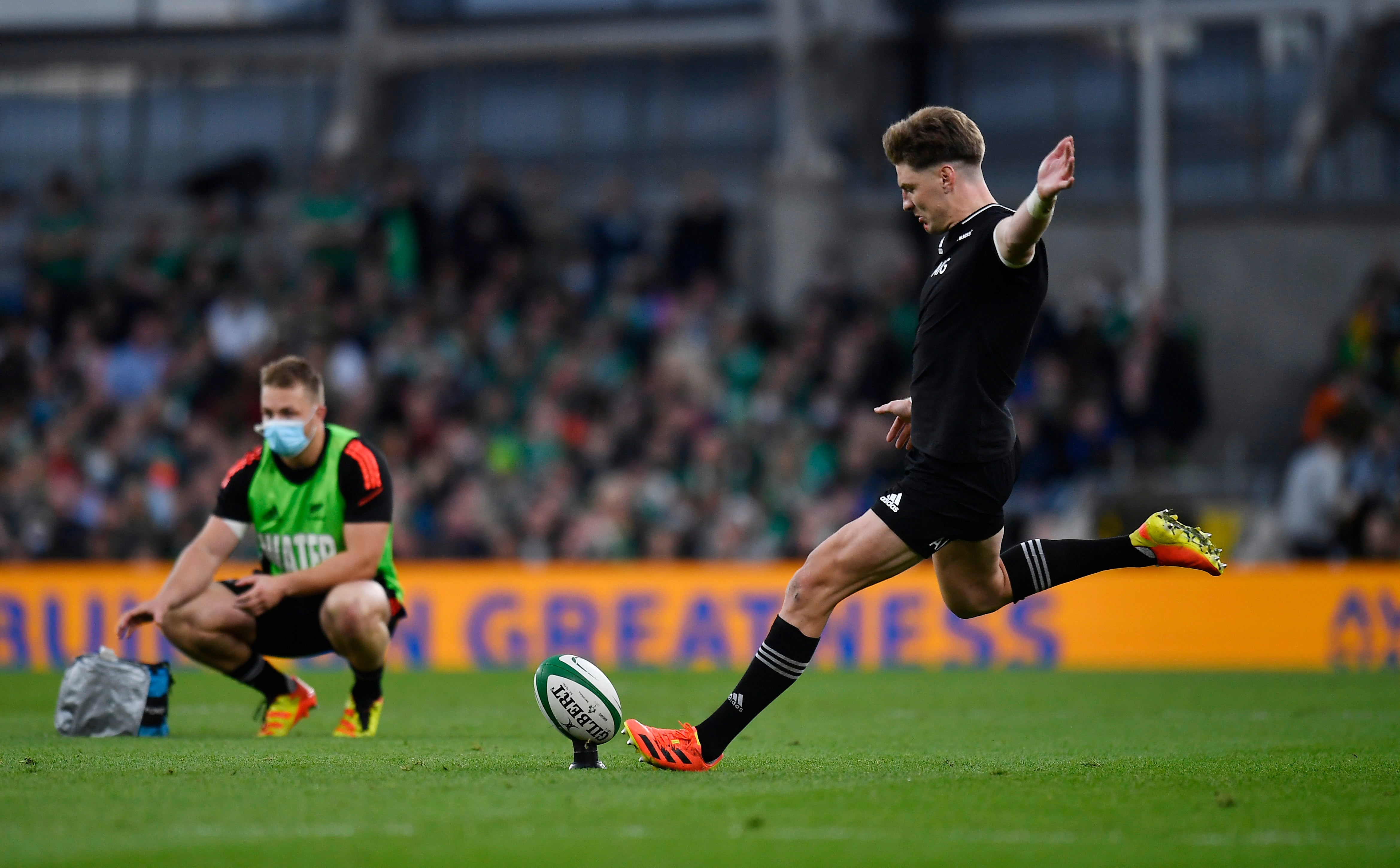 Jordie Barrett kicks a conversion