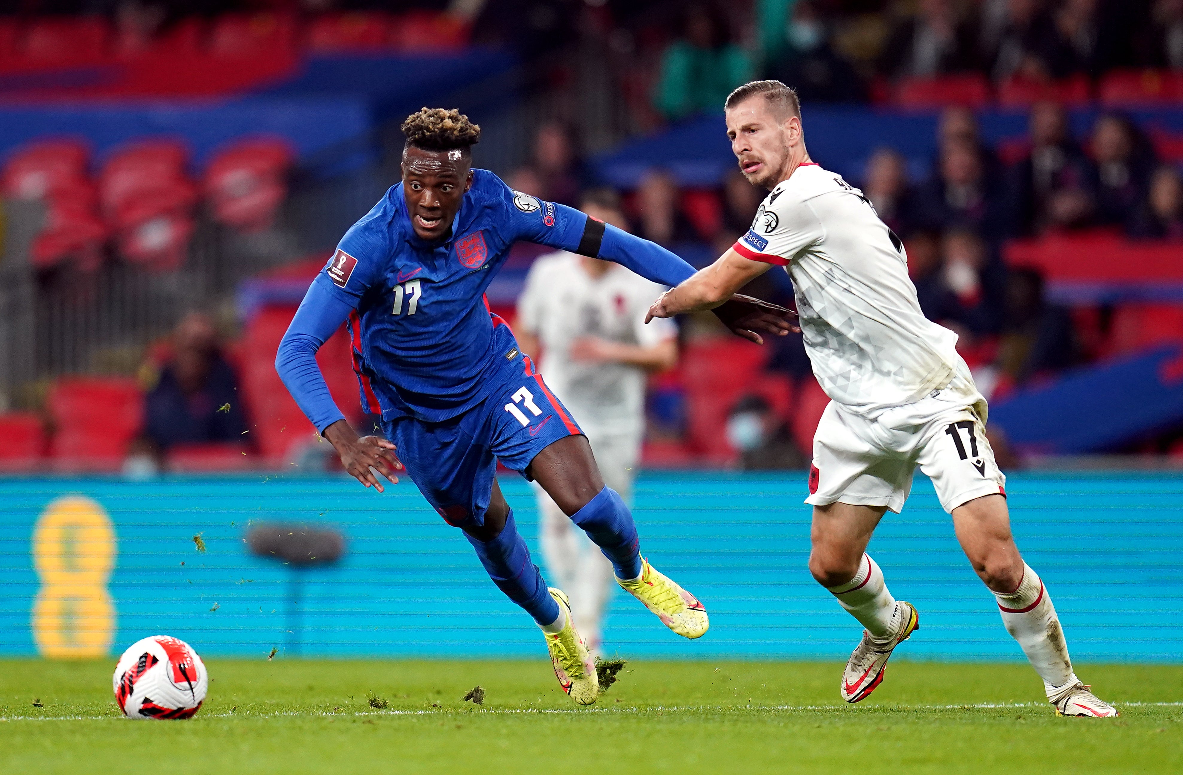 Tammy Abraham, left, takes on Albania’s Ylber Ramadani (Nick Potts/PA)