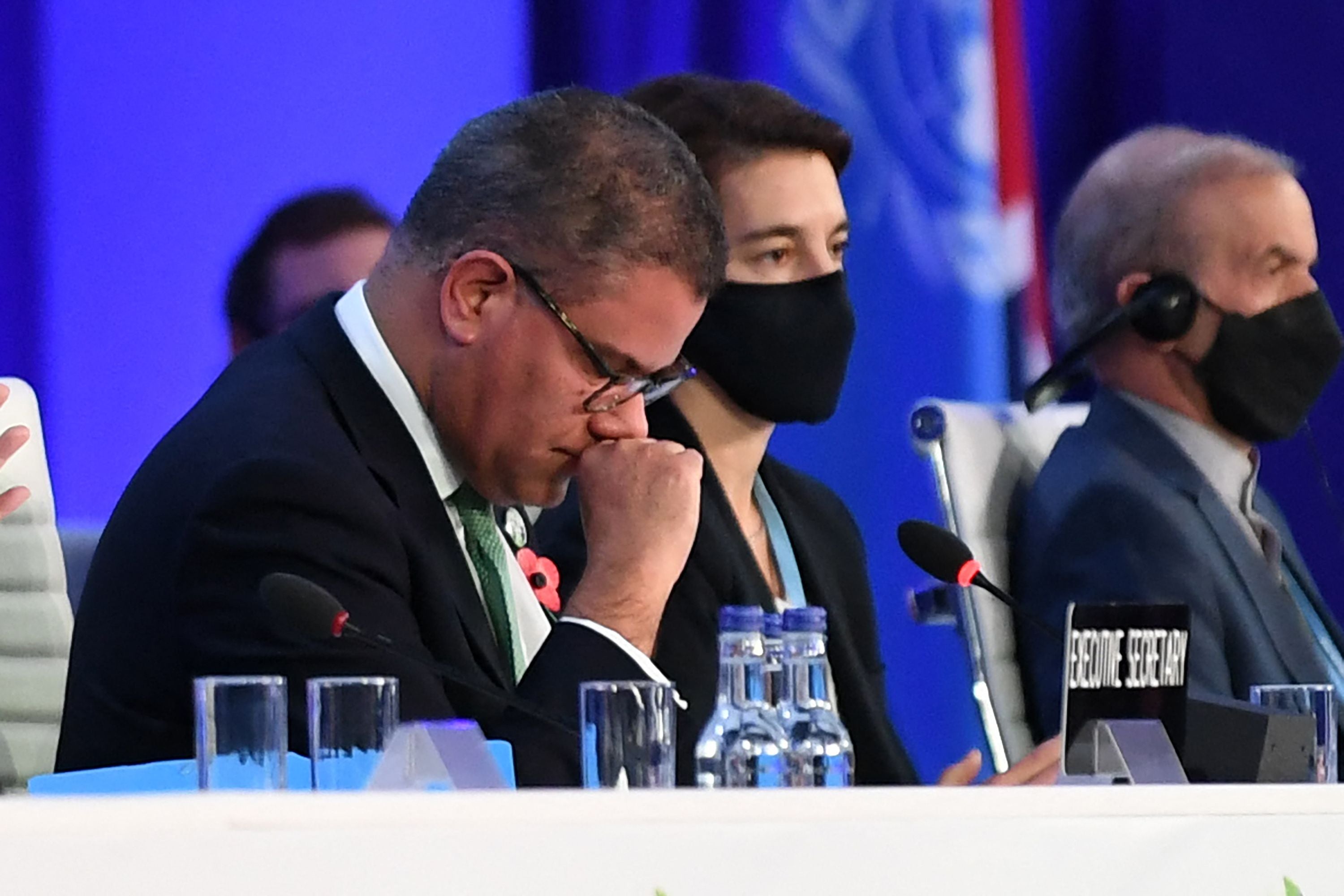 Britain's President for Cop26 Alok Sharma reacts as he makes his concluding remarks after a tense discussions over fossil fuel language in Glasgow in 2021