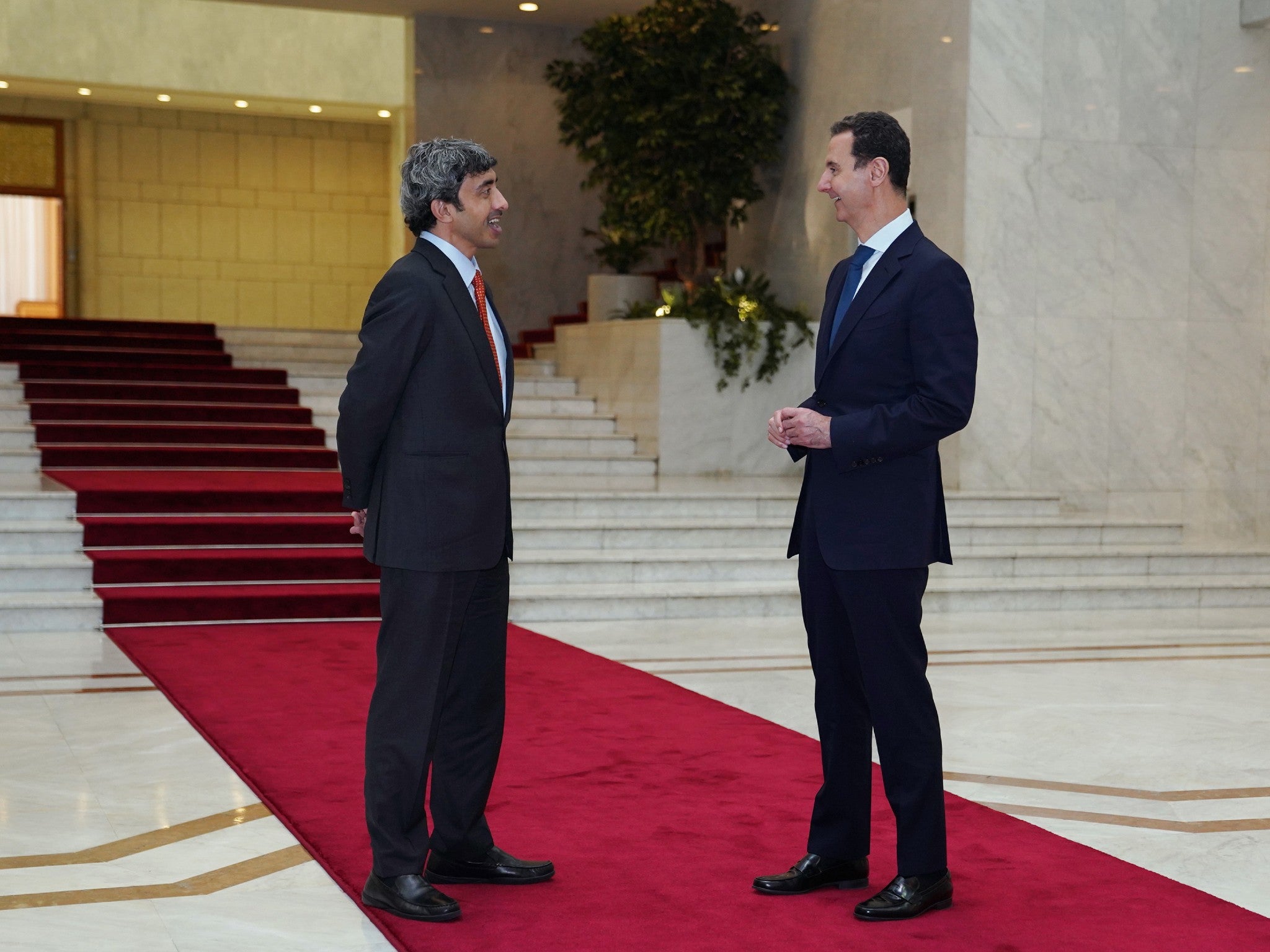 The UAE’s Sheikh Abdullah bin Zayed Al Nahyan, left, talking with Syrian president Bashar-al Assad