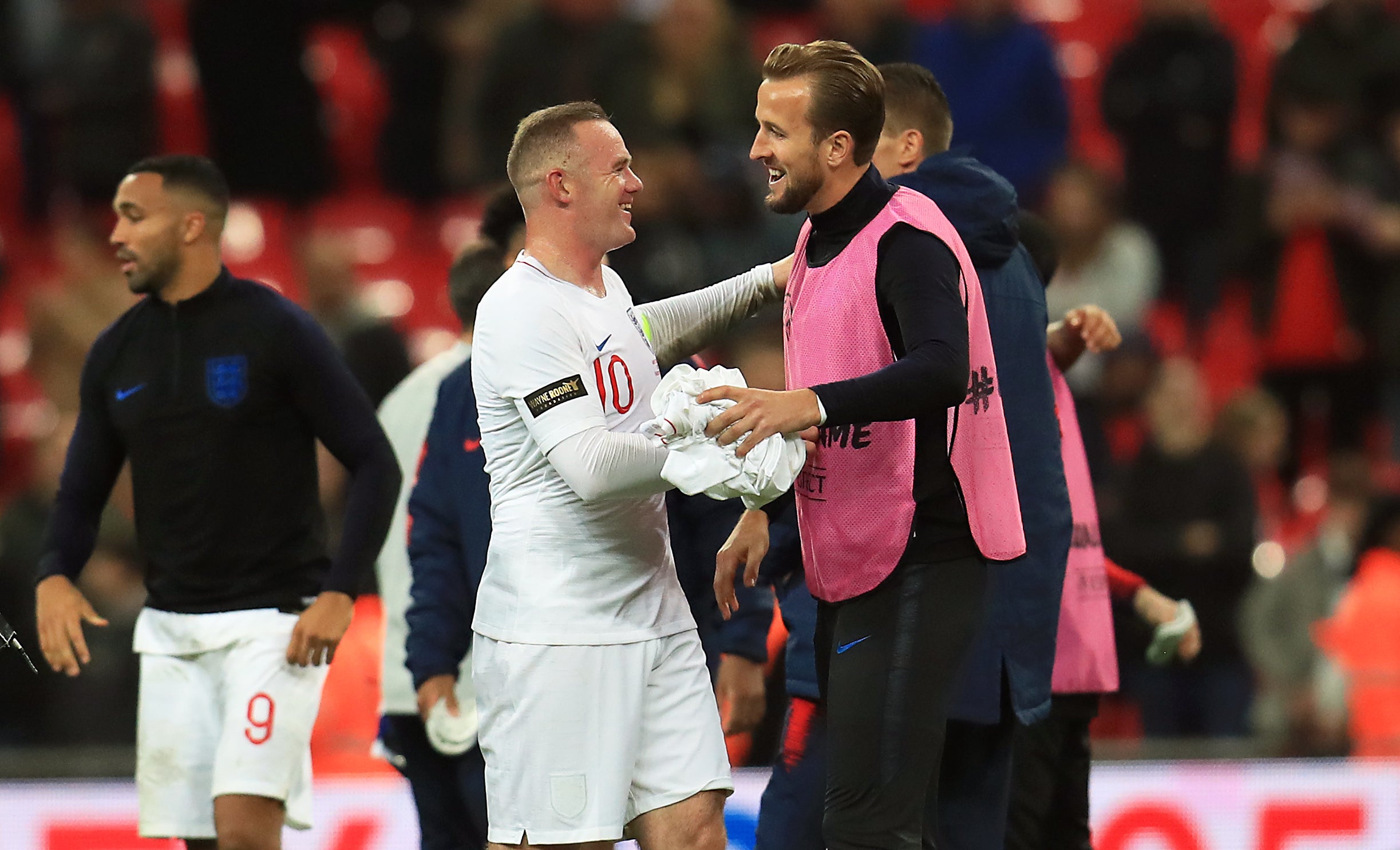 Wayne Rooney, left, celebrates with Harry Kane (Mike Egerton/PA)