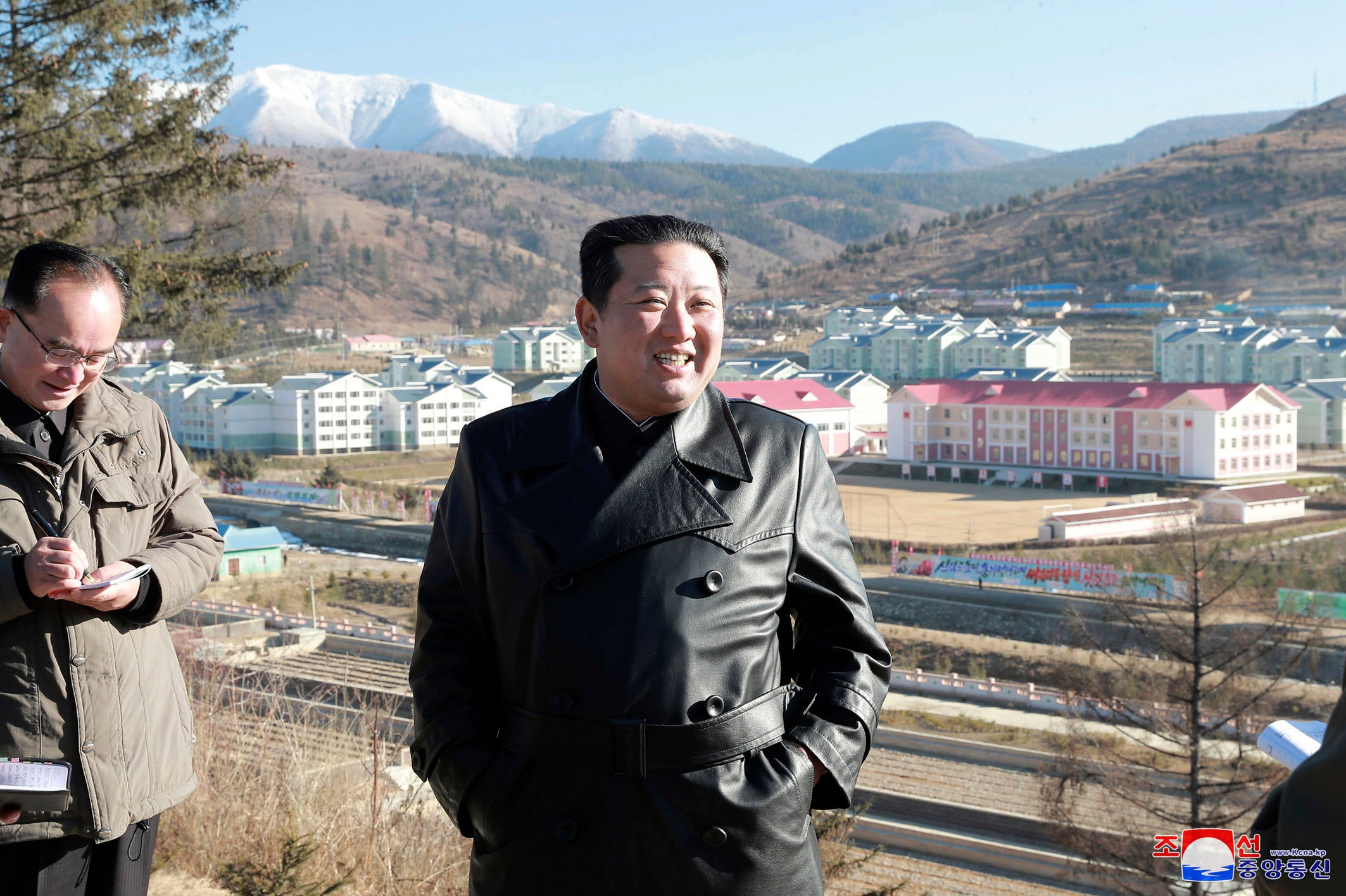 This undated photo provided on 16 November 2021 by the North Korean government. North Korean leader Kim Jong-un inspects the construction site of Samjiyon city