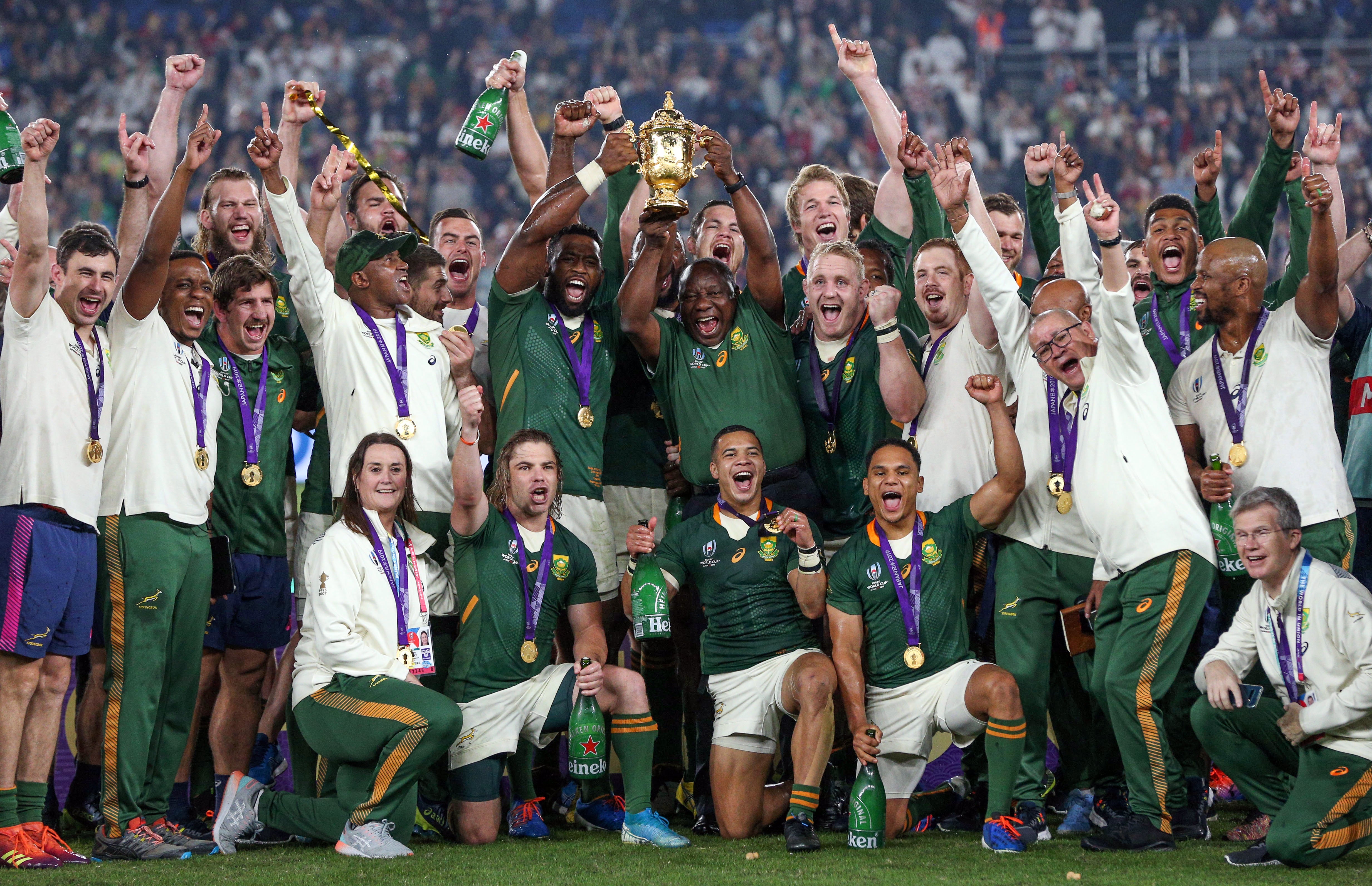 Cyril Ramaphosa, President of South Africa lifts the Webb Ellis Cup with Siya Kolisi of South Africa following their victory against England in the Rugby World Cup 2019 in Yokohama (PA Wire)