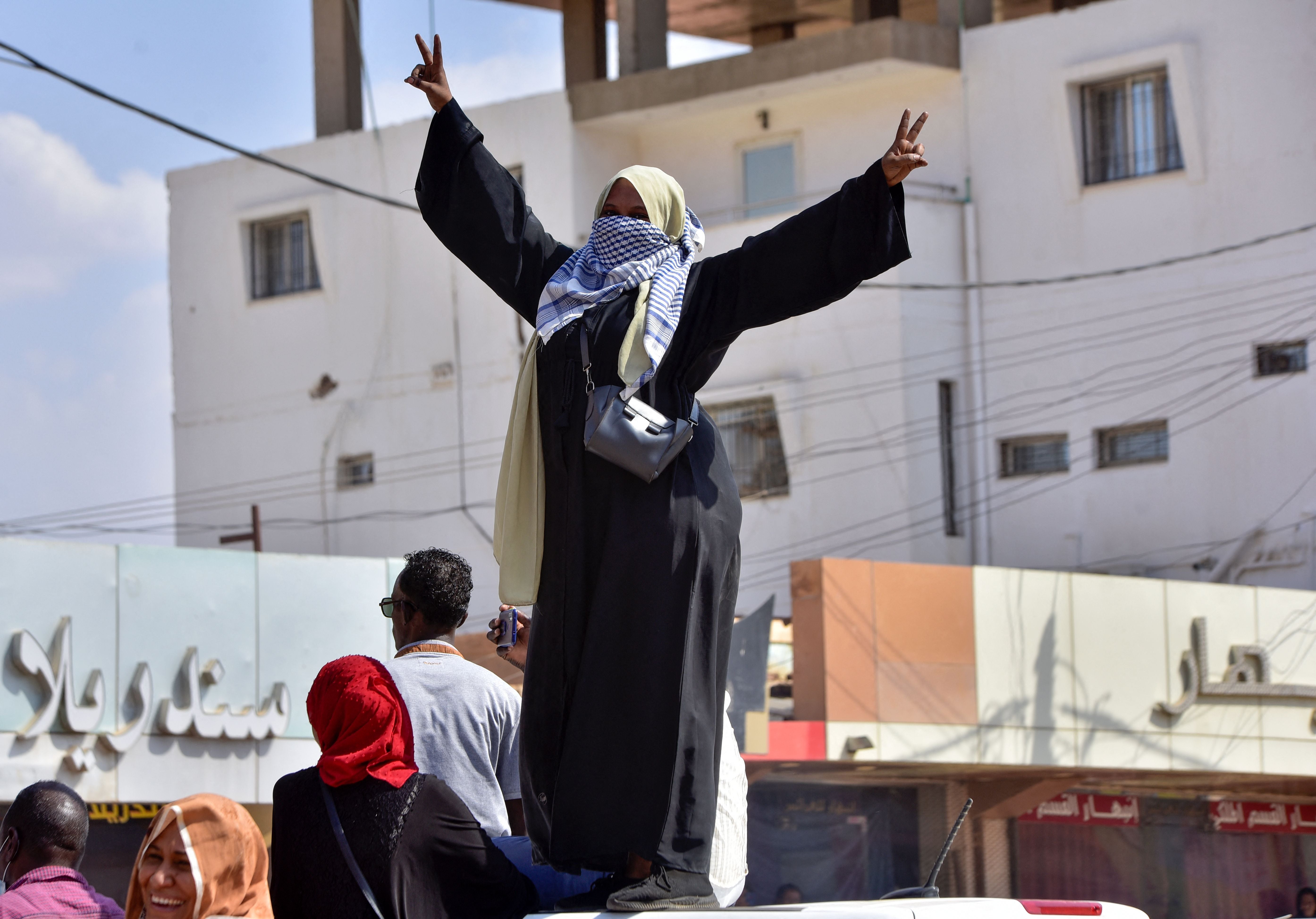 A woman protests in Khartoum Bahri, the northern twin city of the Sudanese capital