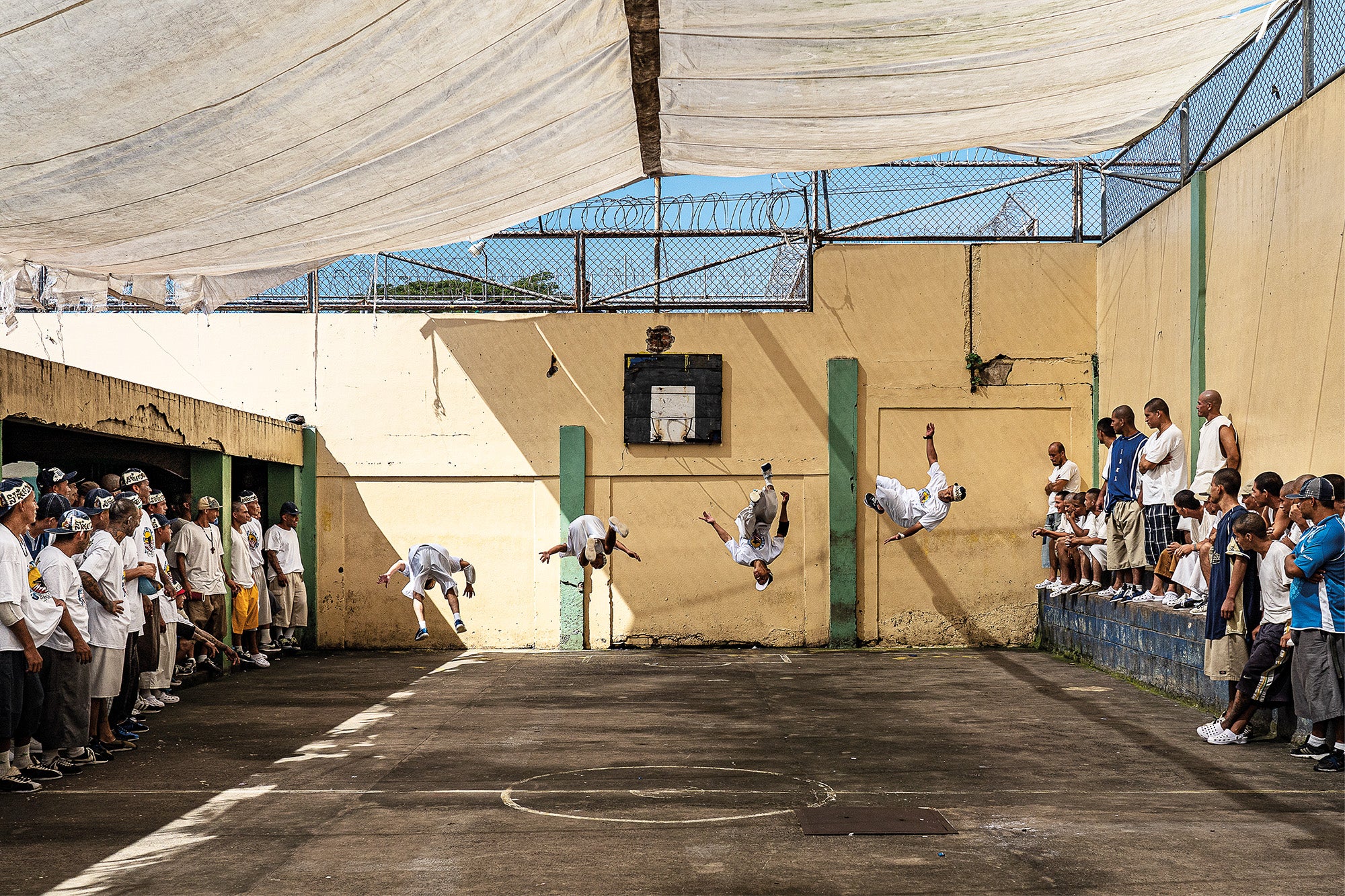 Inmates perform gymnastics at the Chalatenango Penal Centre