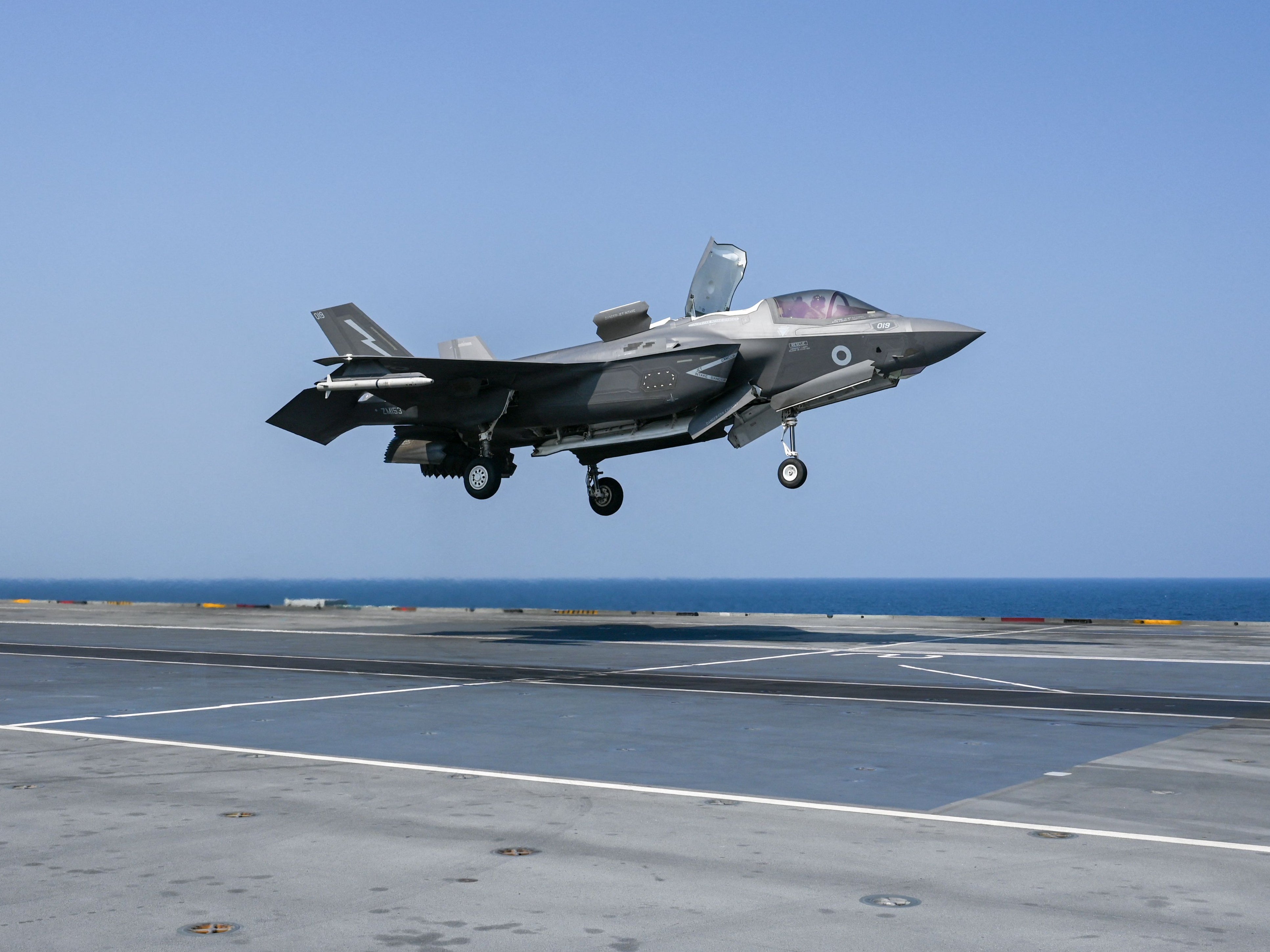 An F35 fighter jet prepares to land on the flight deck of HMS Queen Elizabeth last month