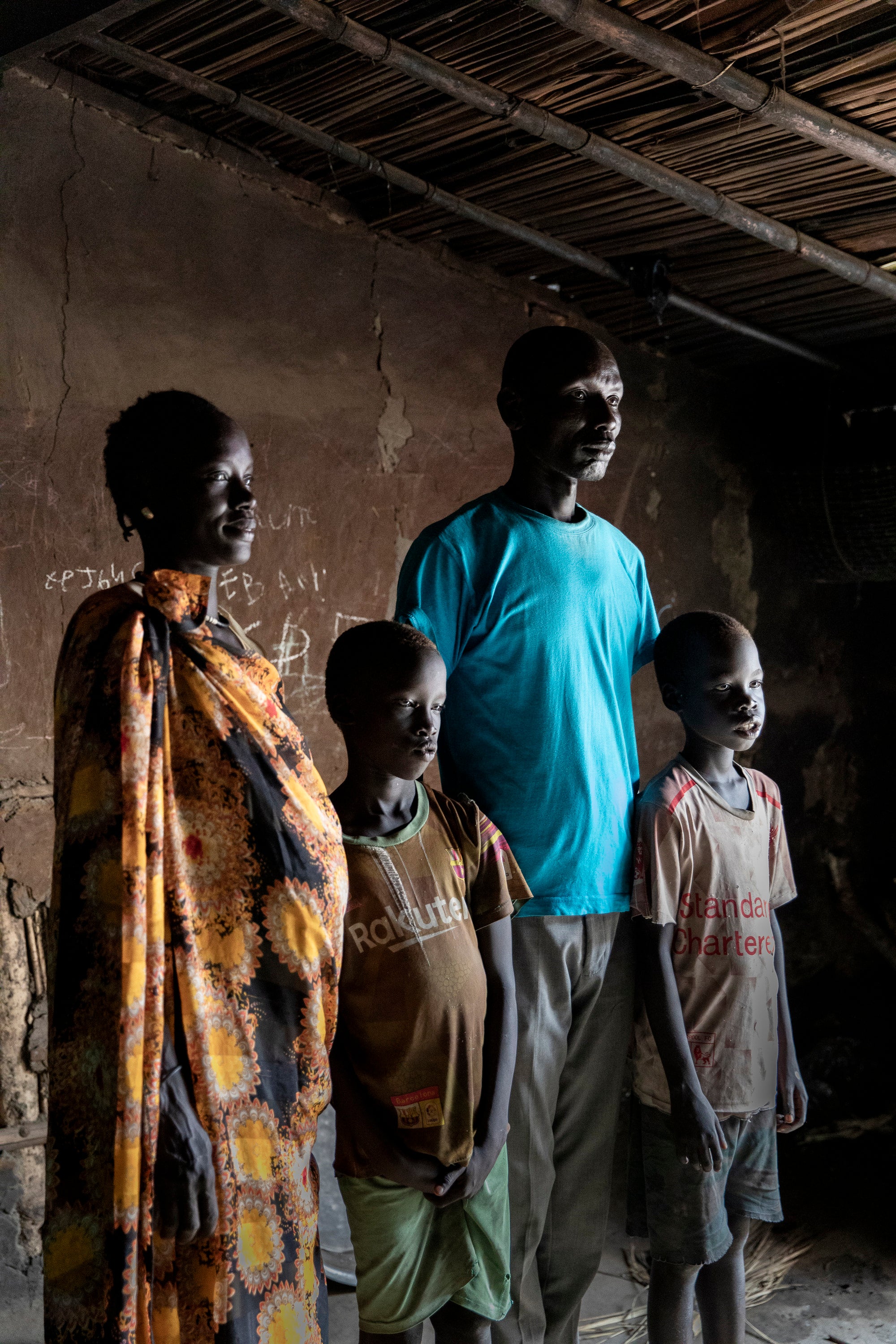 Dhoal Gatwich Gatjani with Angelina Nyakuor and their 10-year-old twins Kerwar Goal, left, and Goal Dhoal at the Bentiu displacement camp