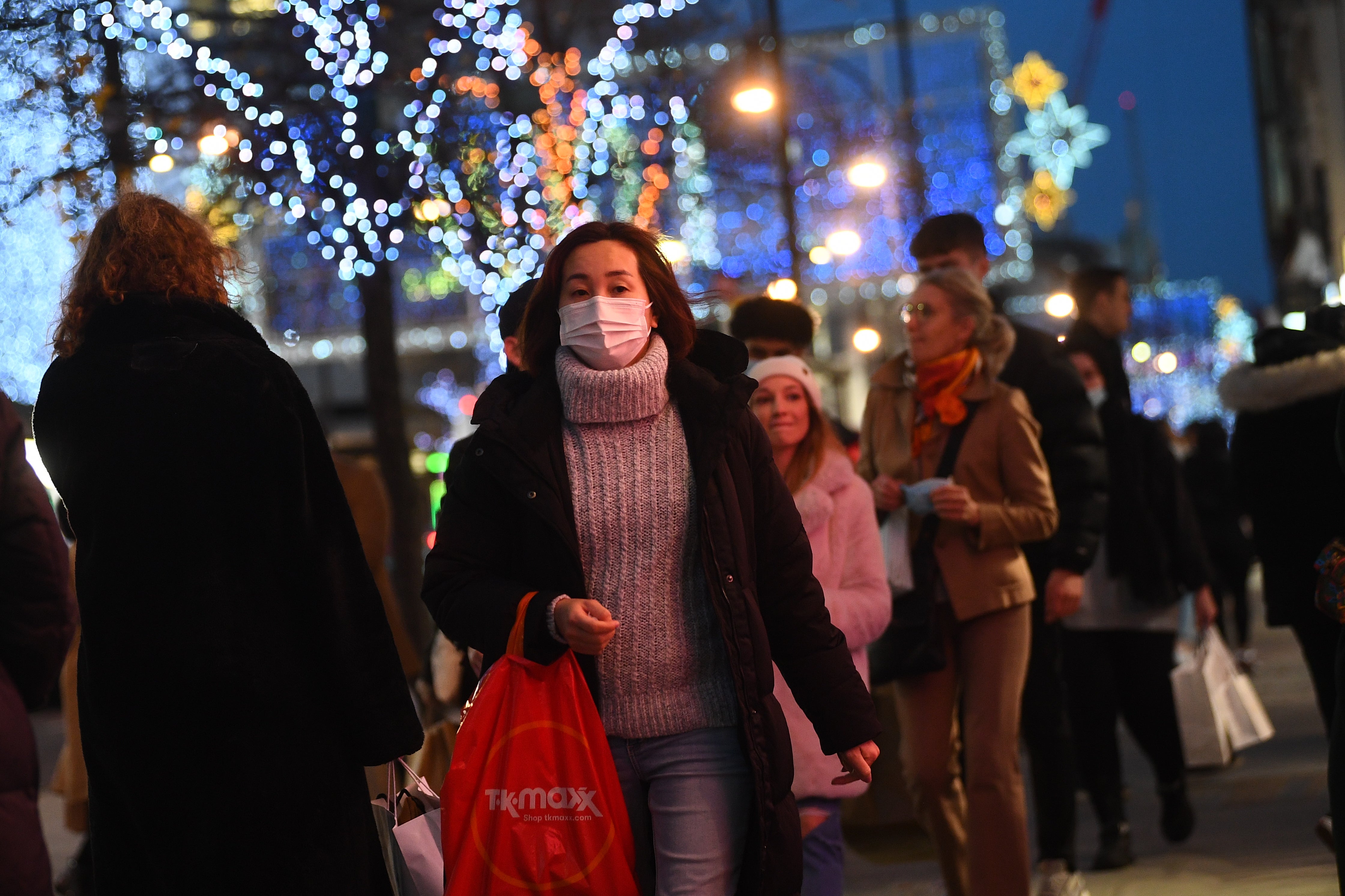 People shopping in Oxford Street in London (PA)