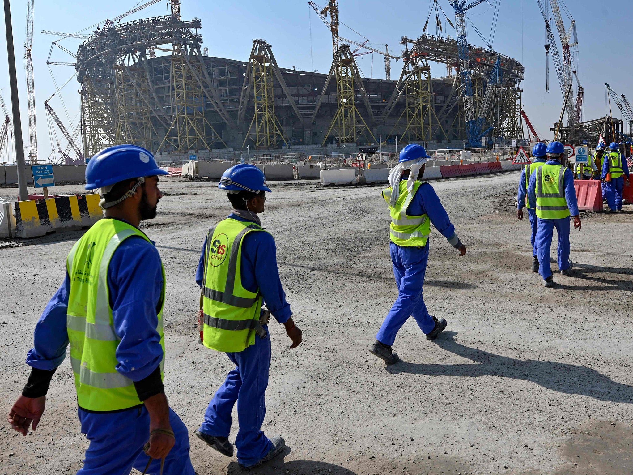 Construction workers at Qatar’s Lusail Stadium in 2019