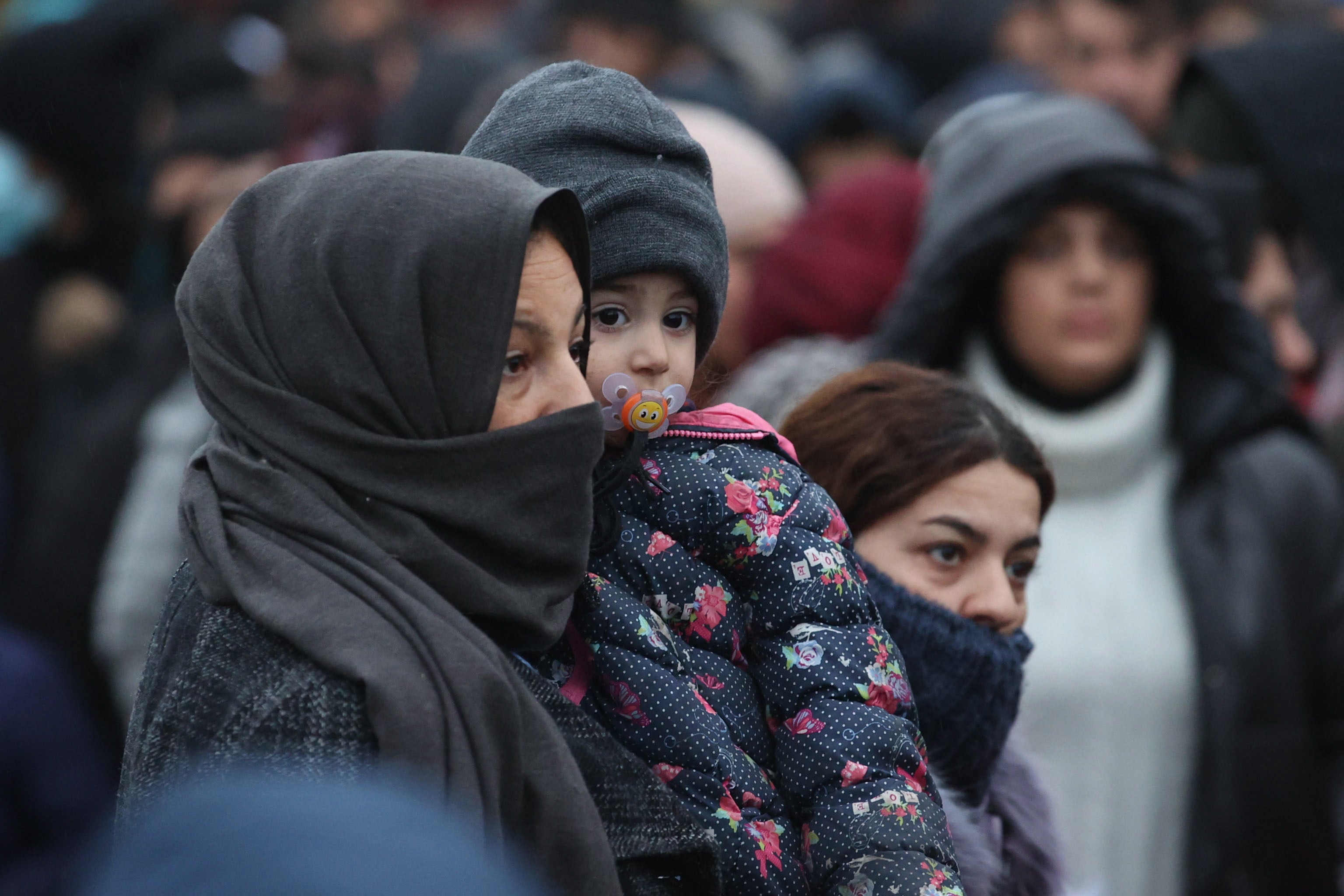 A mother and child on the Belarus/Poland border