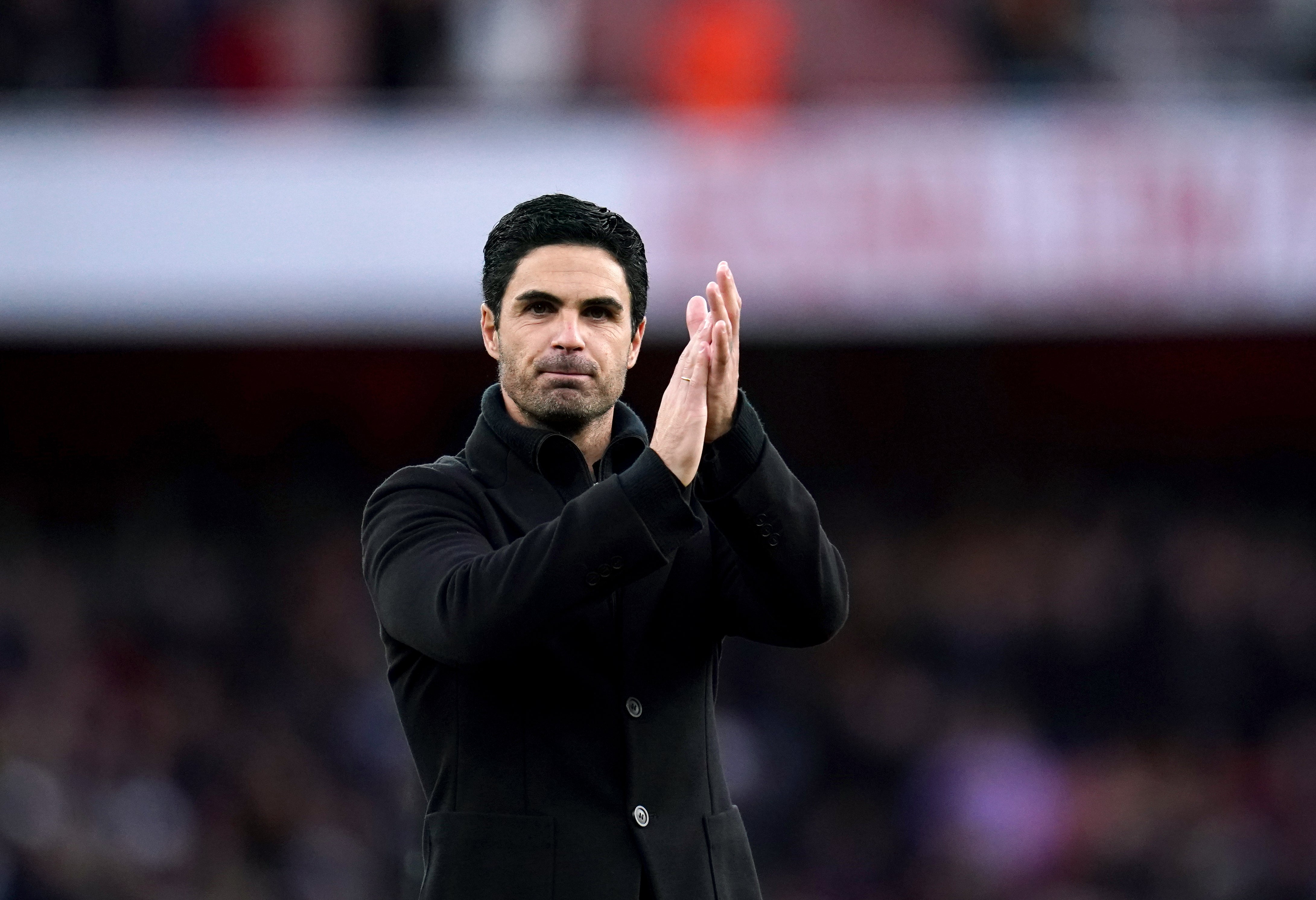 Mikel Arteta welcomes talk of Arsenal finishing in the top four this season (John Walton/PA)