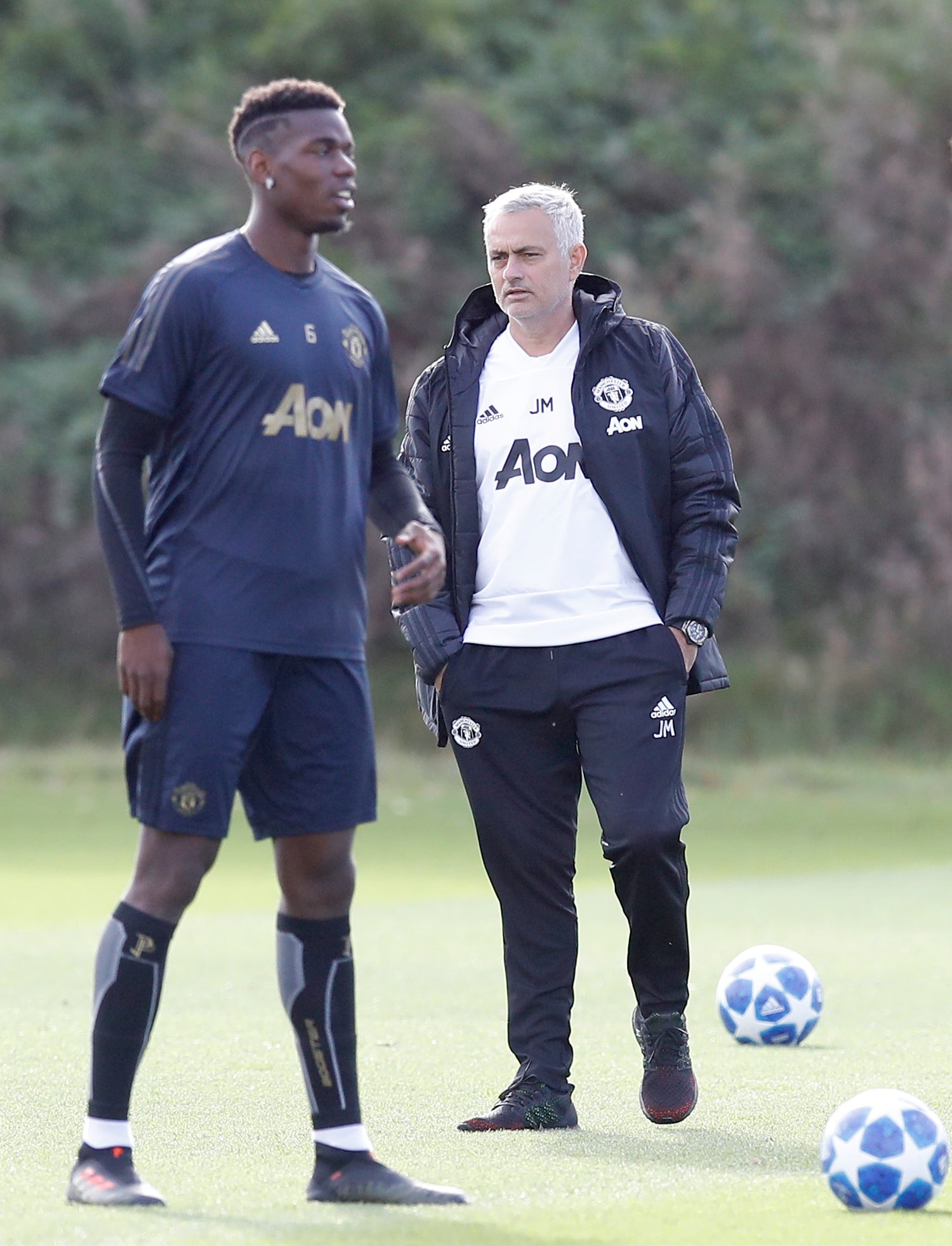 Mourinho (right) had a fractious relationship with Paul Pogba (left) (Martin Rickett/PA)