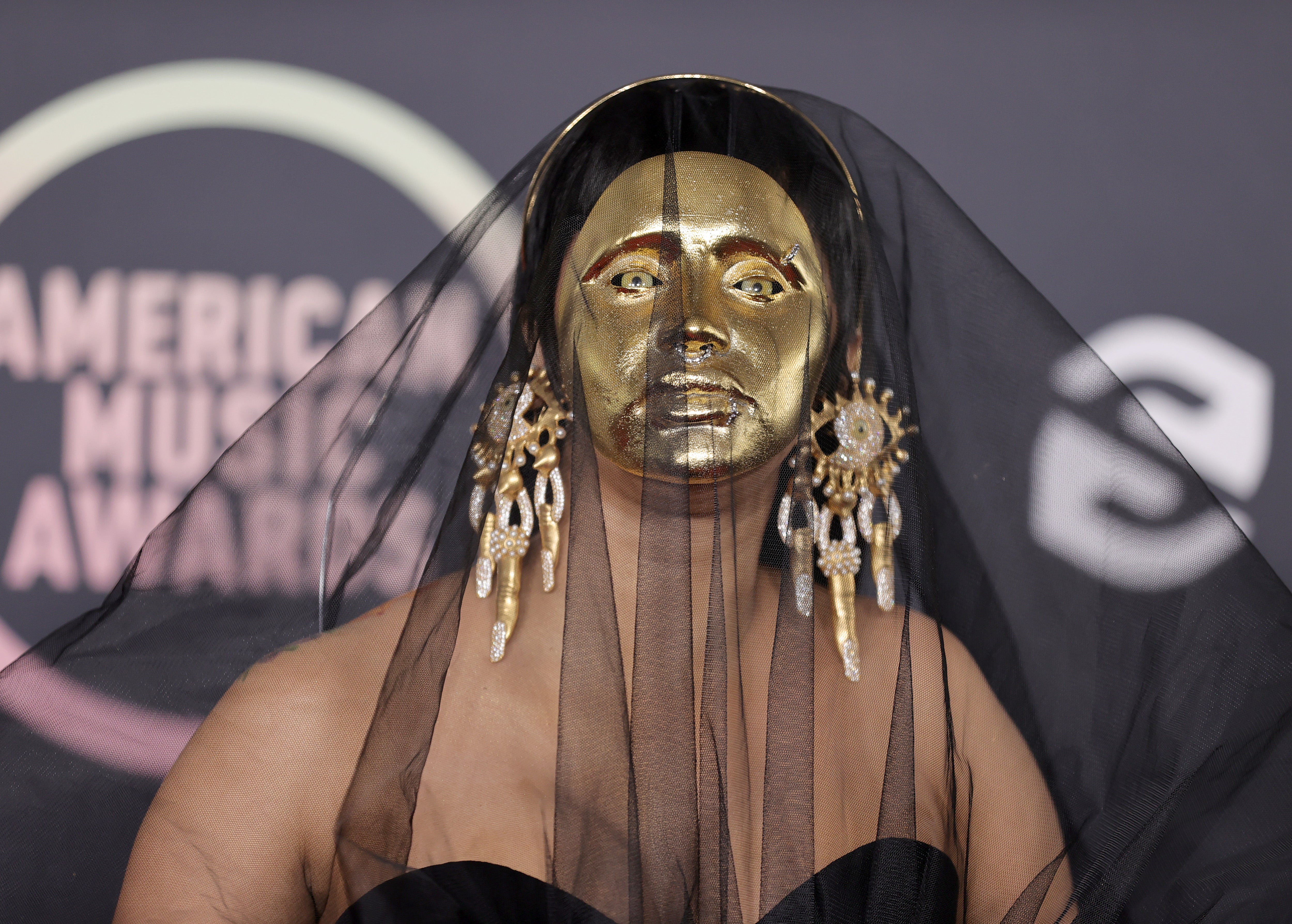 Cardi B appears on the red carpet at the AMAs