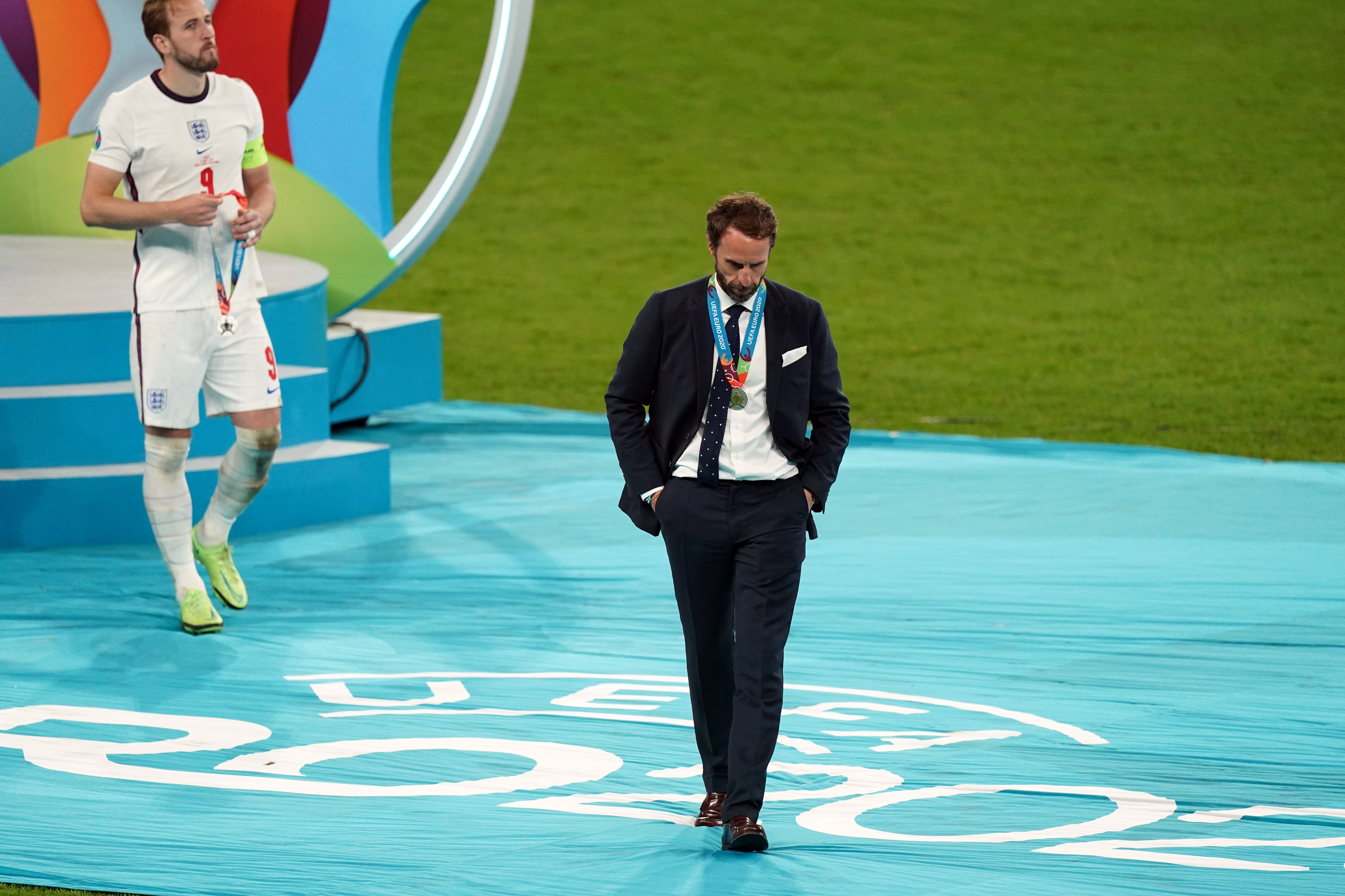 Gareth Southgate and England captain Harry Kane, left, collect their Euro 2020 runners-up medals (Mike Egerton/PA)