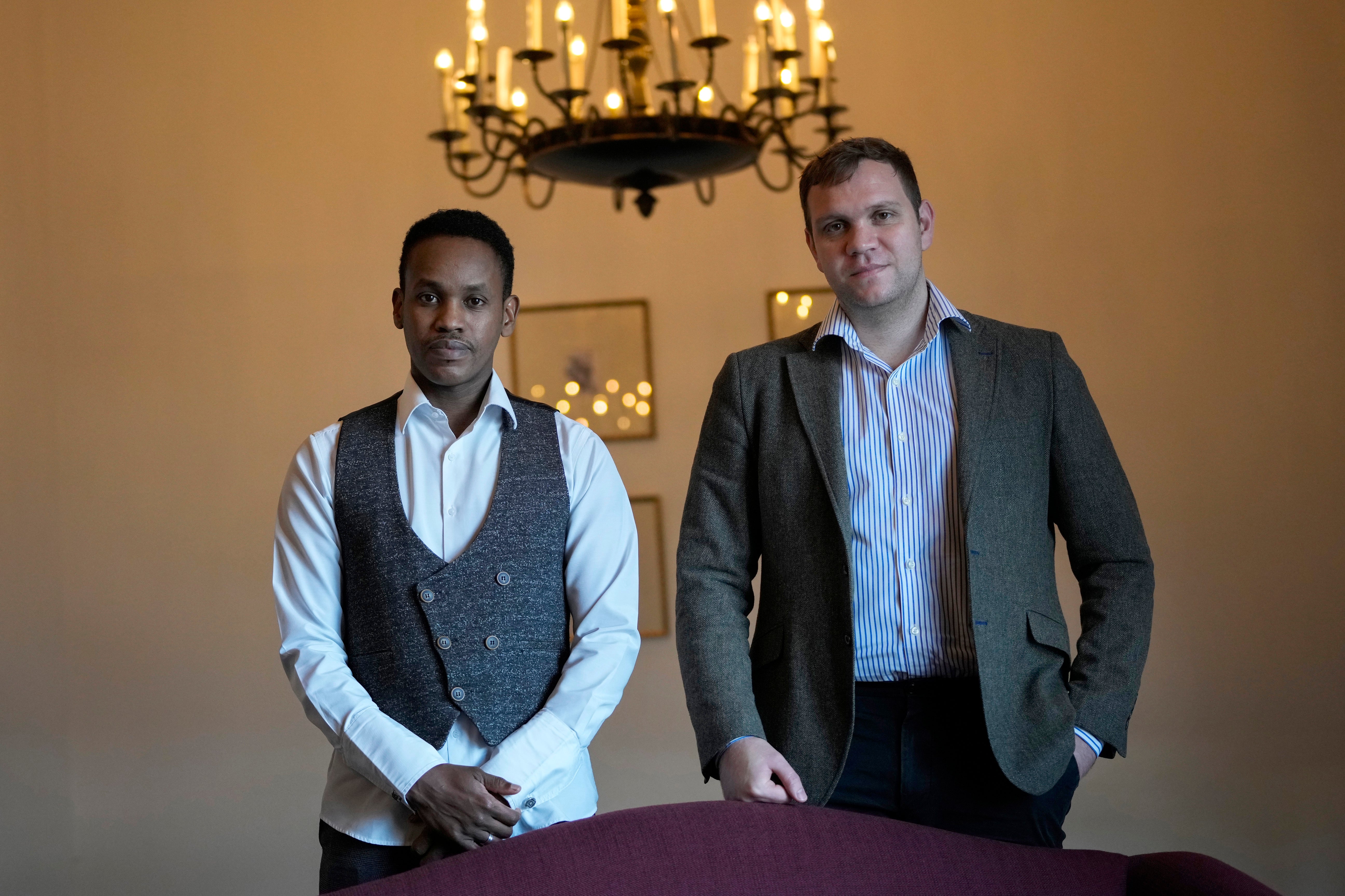 British citizens Ali Issa Ahmad, left, and Matthew Hedges attend a news conference in Istanbul