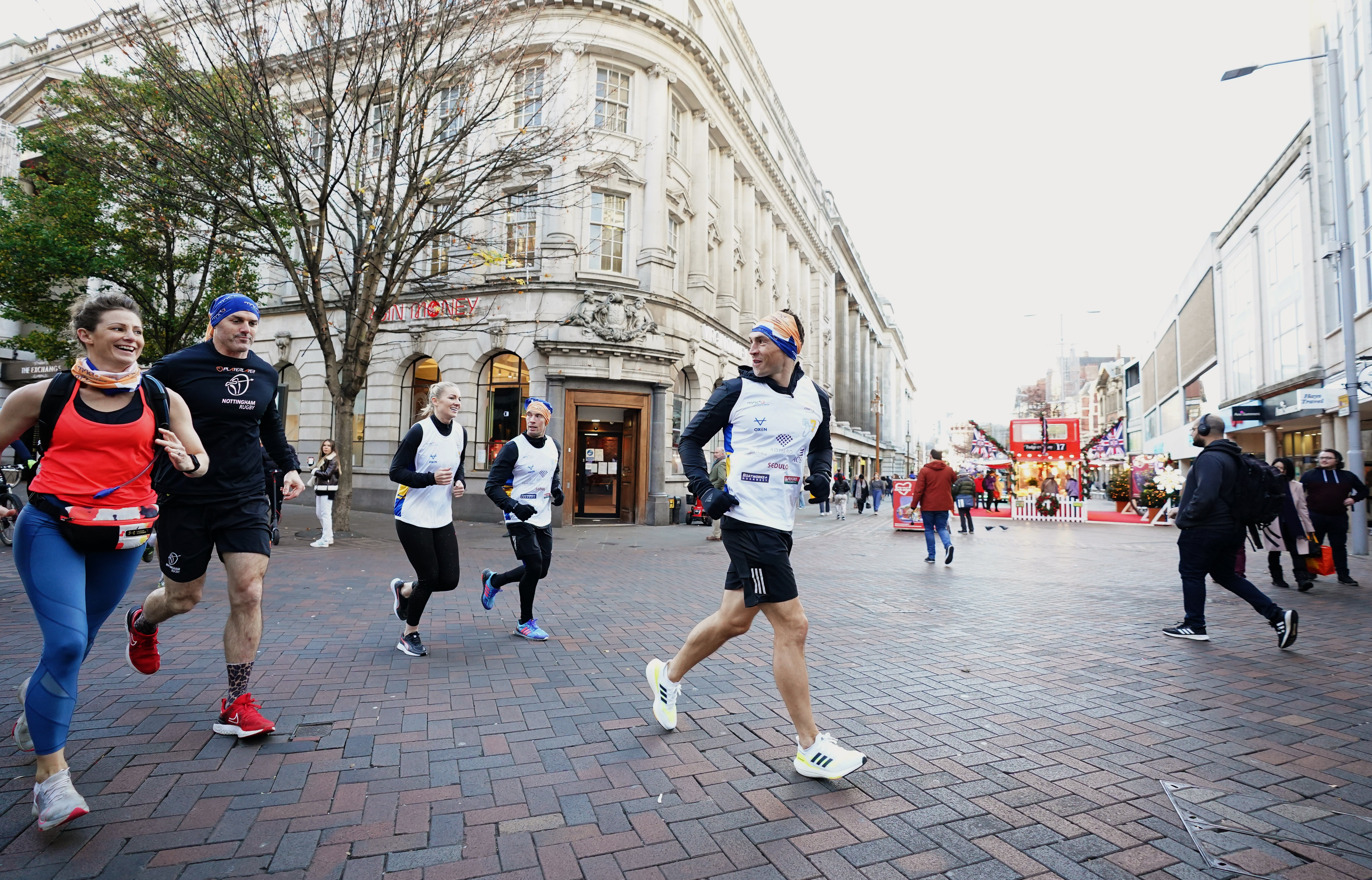 Kevin Sinfield crosses Long Row in Nottingham city centre during the Extra Mile Challenge (Zac Goodwin/PA)