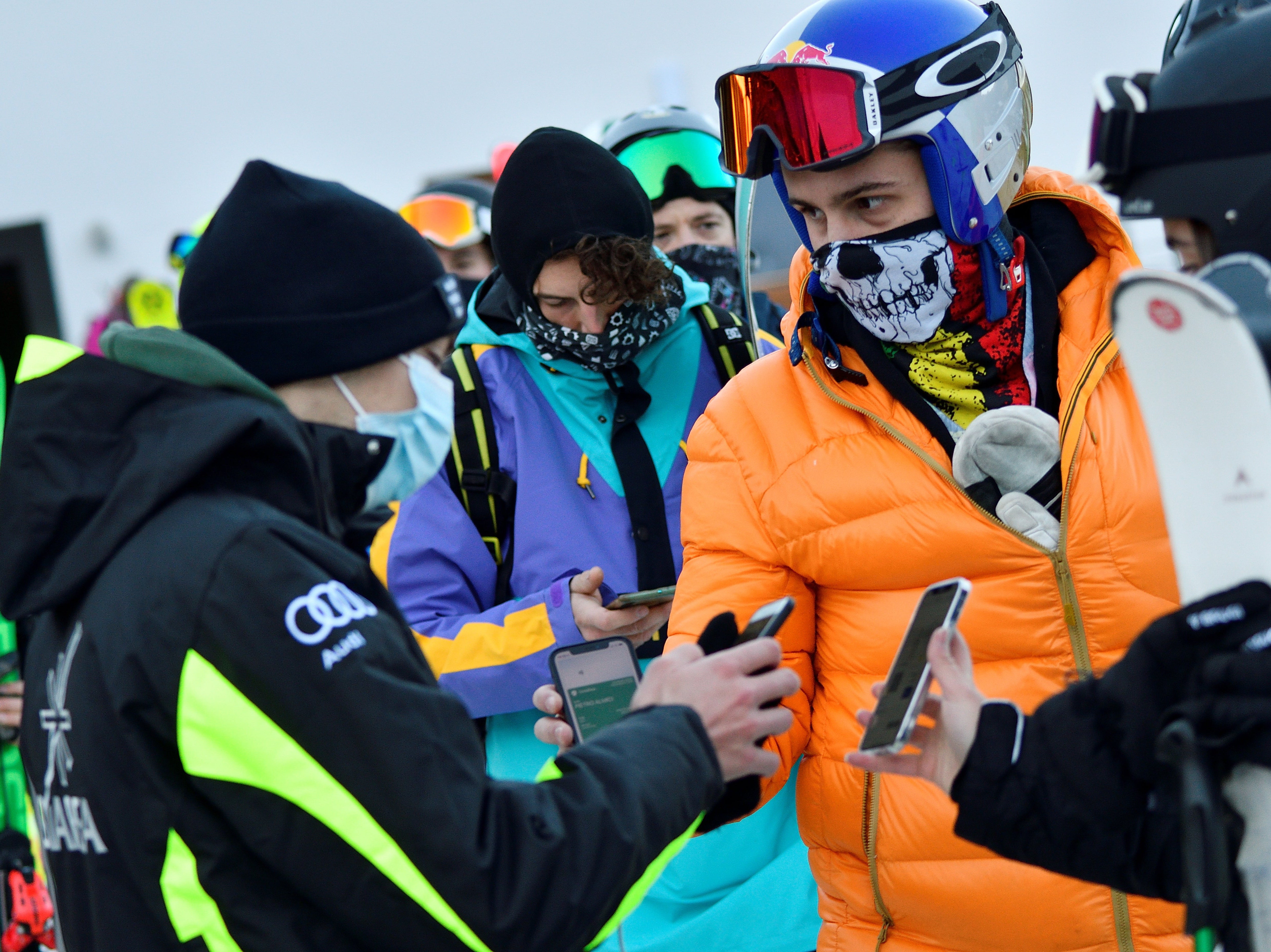 People show their EU digital Covid certificate to access ski lifts in Madonna di Campiglio, northern Italy