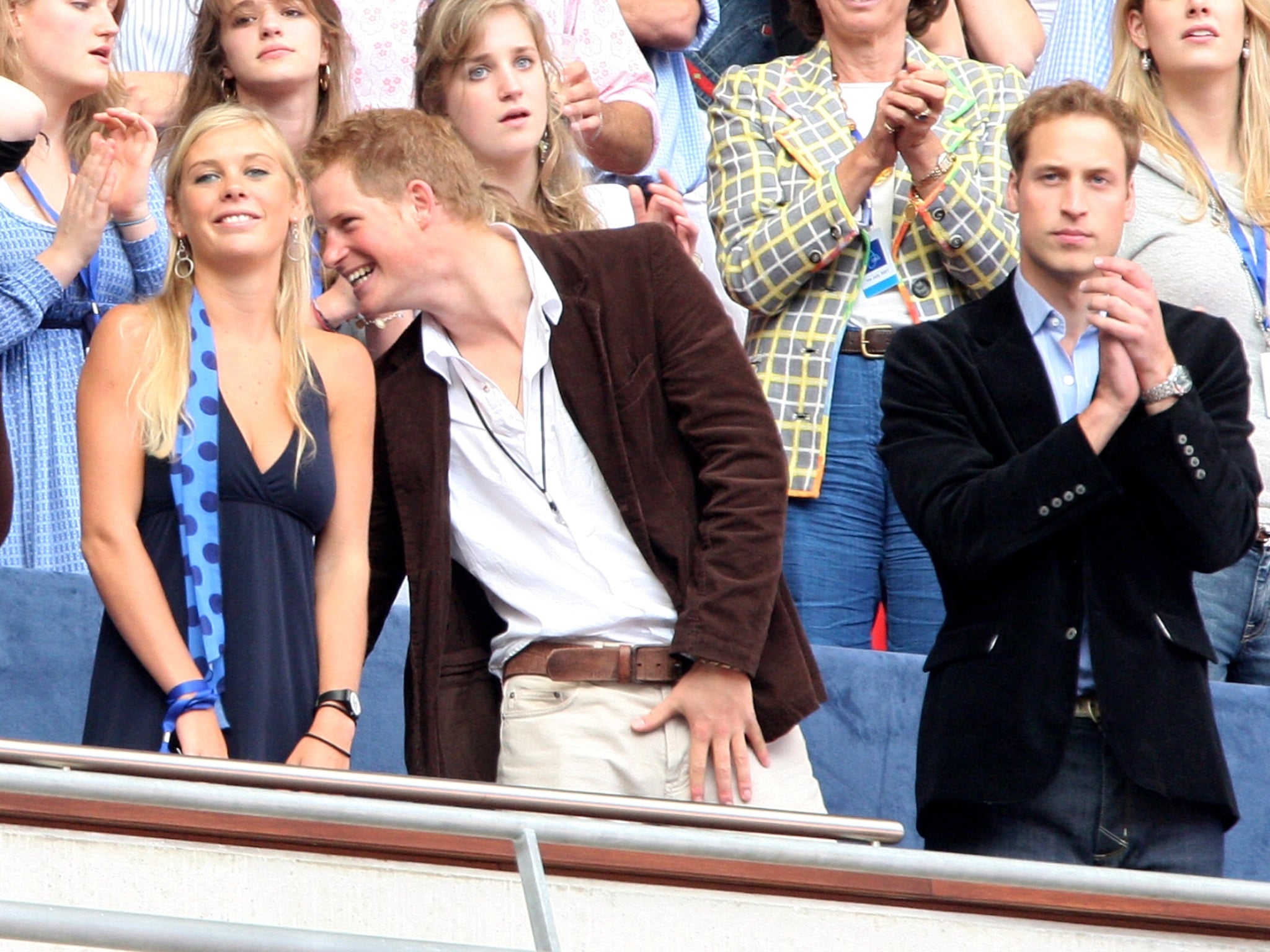 Chelsy with Harry and Prince William at the Diana memorial concert in 2007