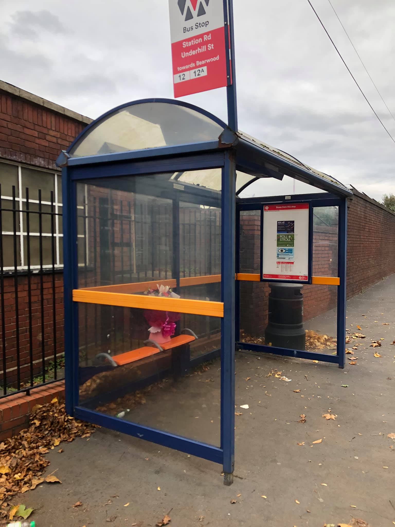 Another arrangement left on a bus stop