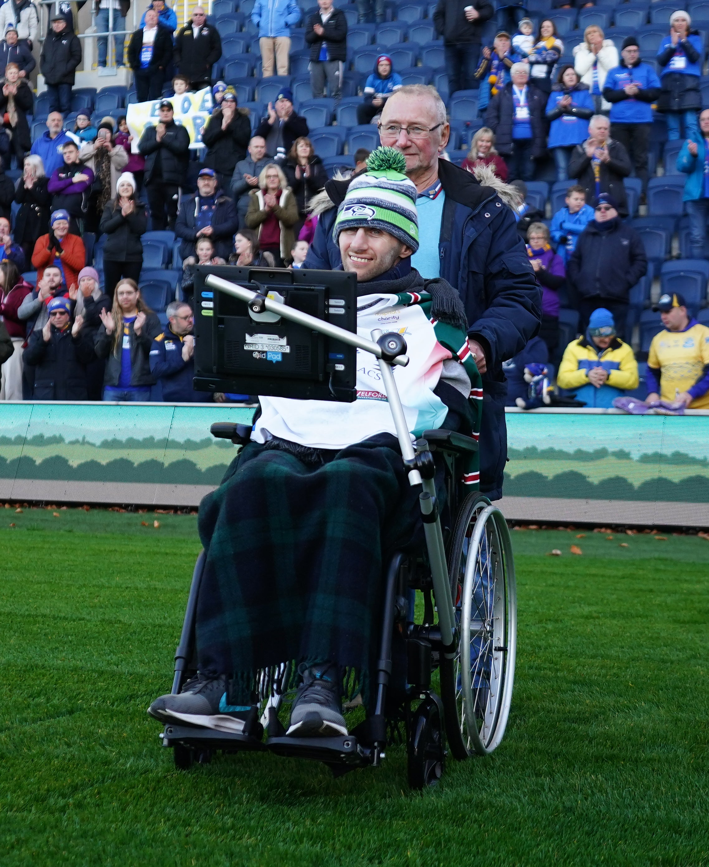Geoff and Rob Burrow at Headingley waiting for the arrival of Kevin Sinfield (Zac Goodwin/PA)
