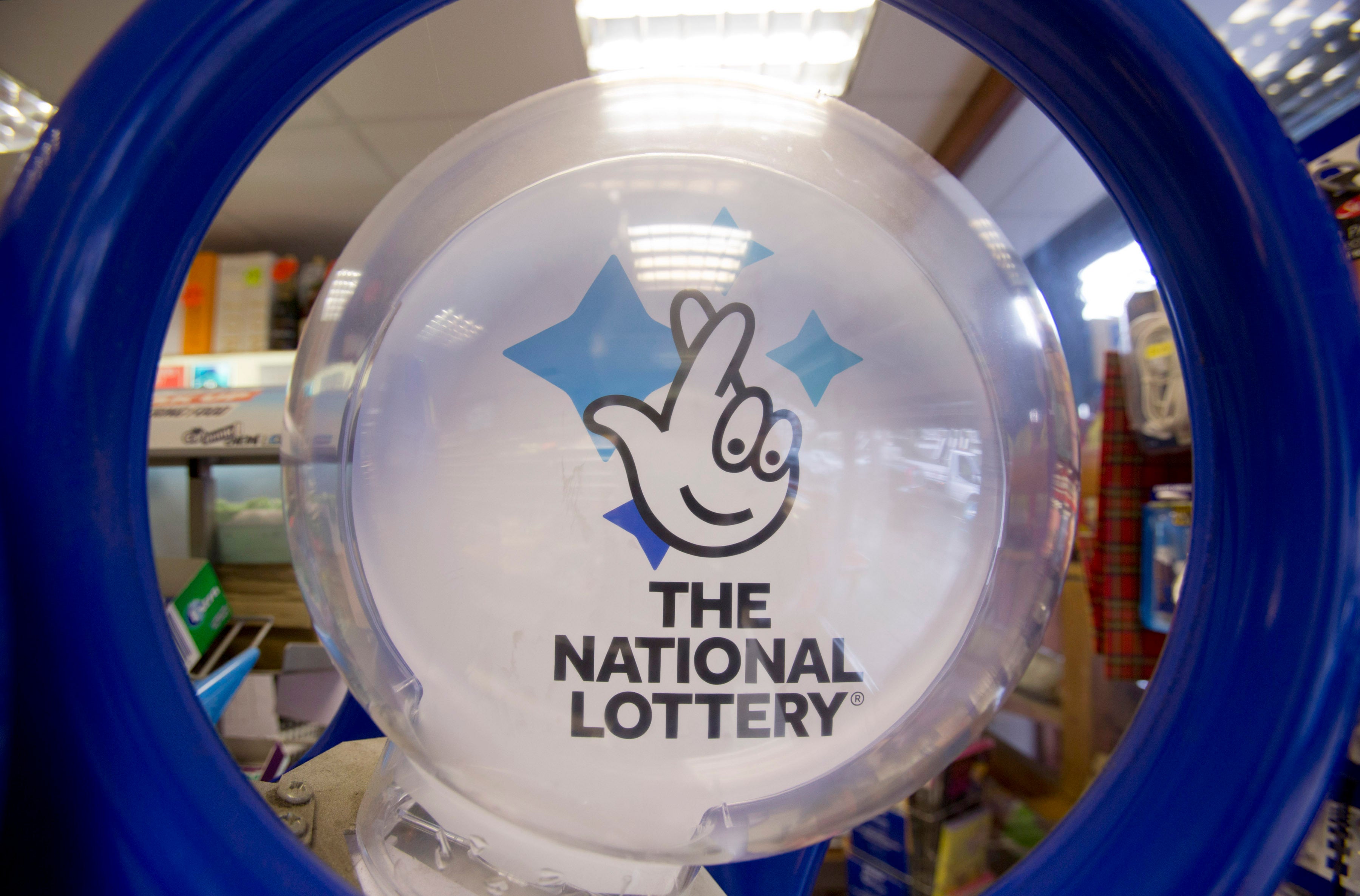 A National Lottery kiosk in a newsagent in north London (Yui Mok/PA)