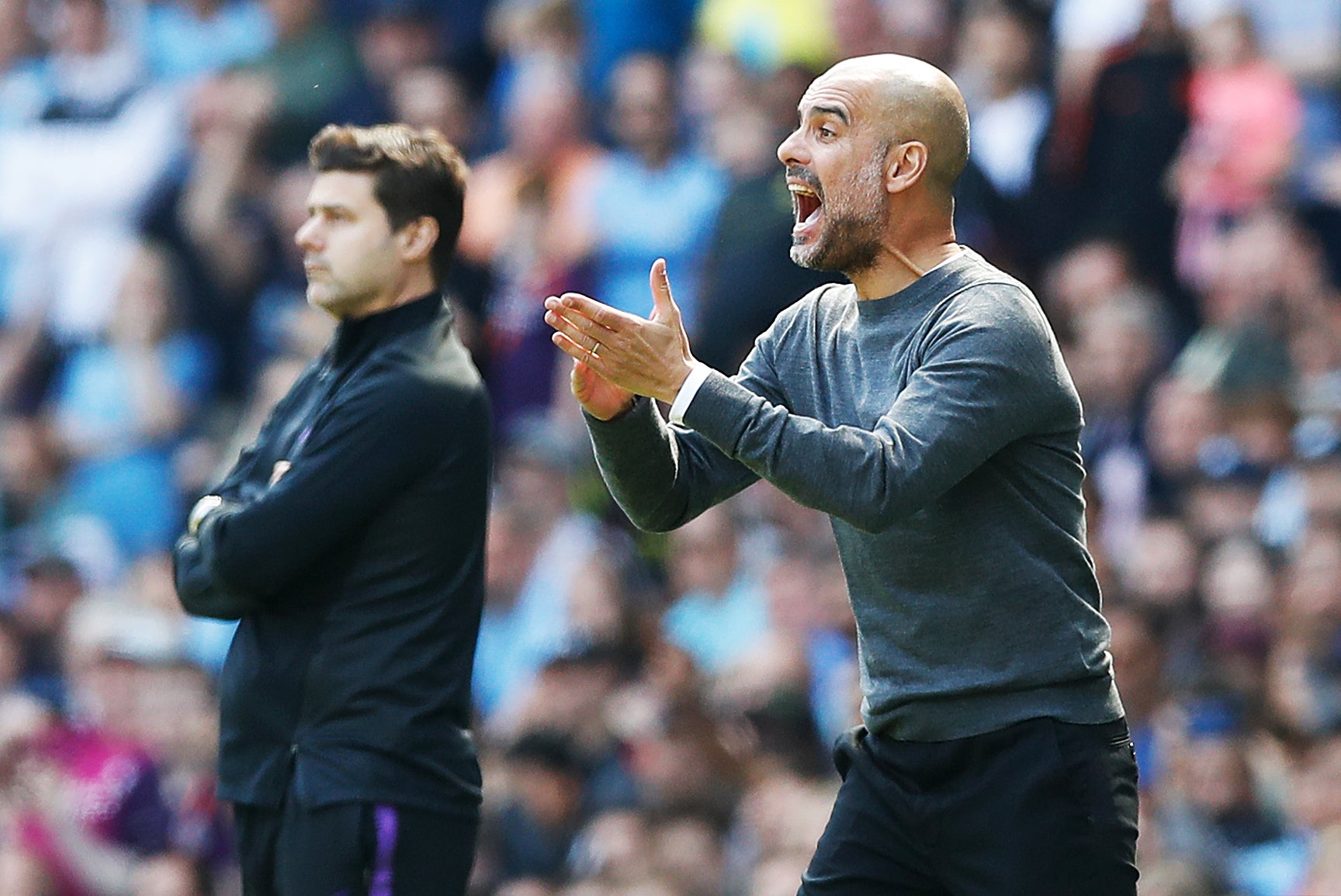 Pep Guardiola, right, is preparing to face Mauricio Pochettino (Martin Rickett/PA)