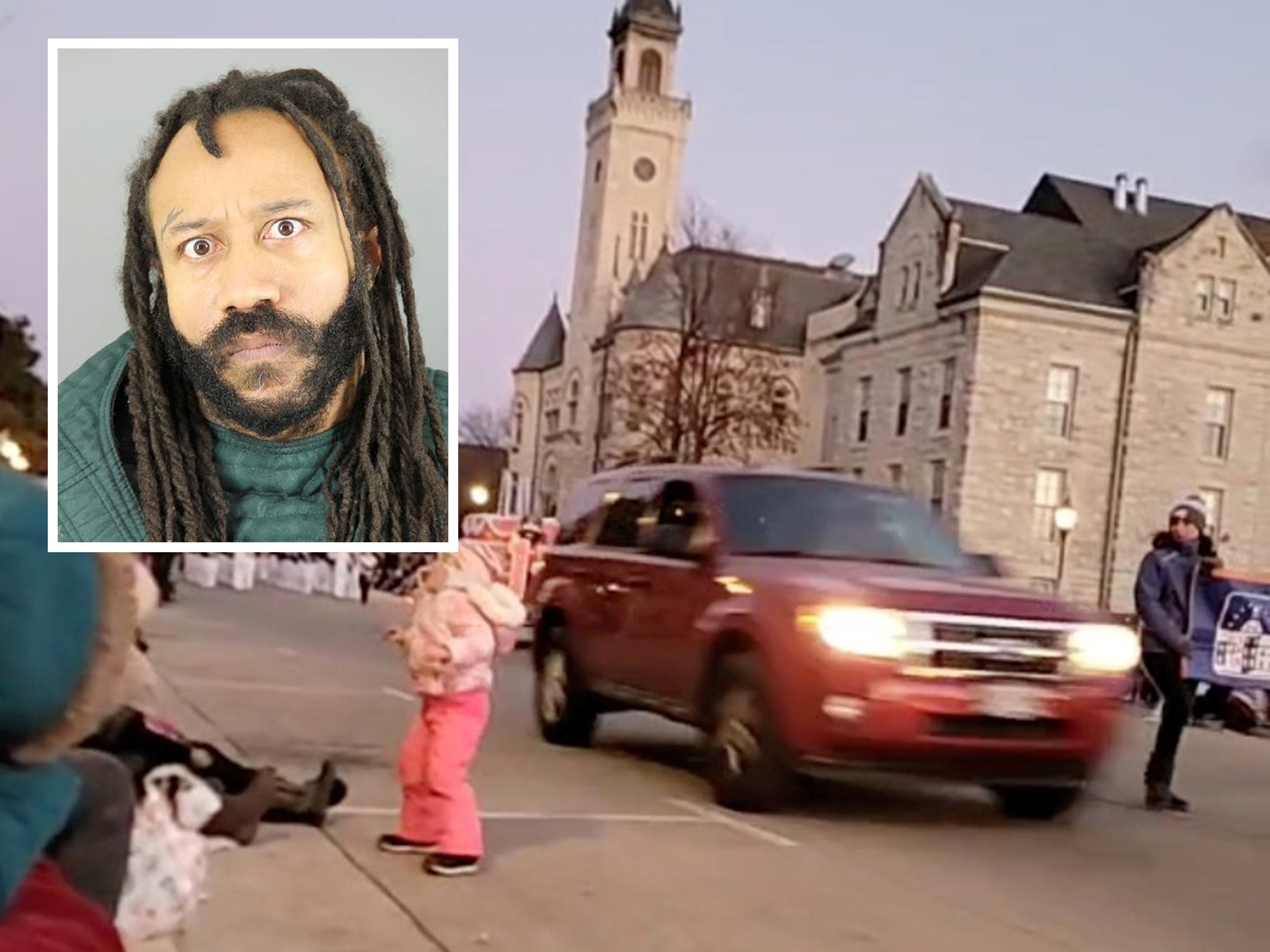 An SUV speeds past moments before plowing into a crowd of people during a Christmas parade in Waukesha, Wisconsin, U.S., in this still image taken from a November 21, 2021 social media video