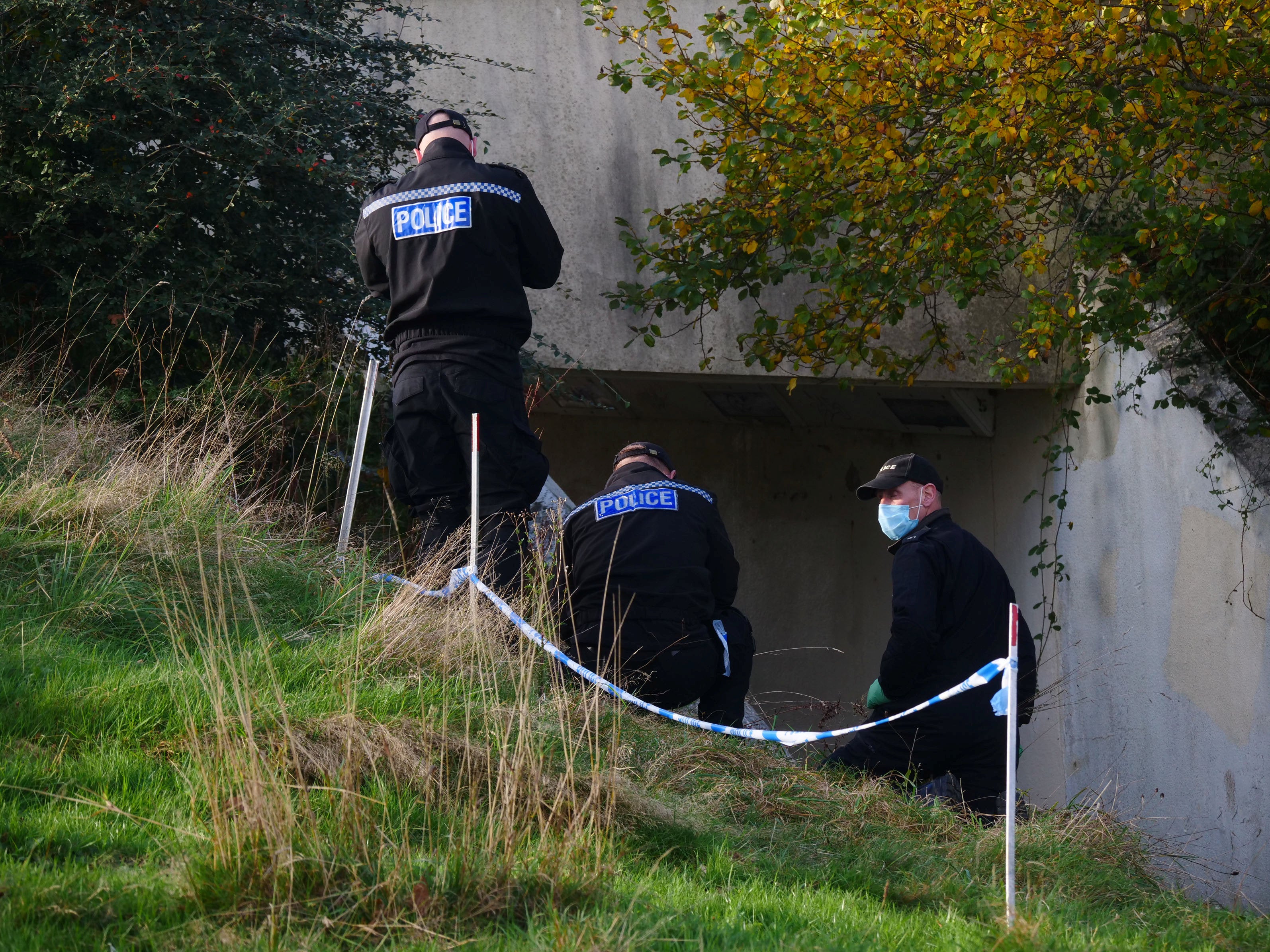 Officers were pictured today conducting fingertip and forensic work near the area the teenager went missing