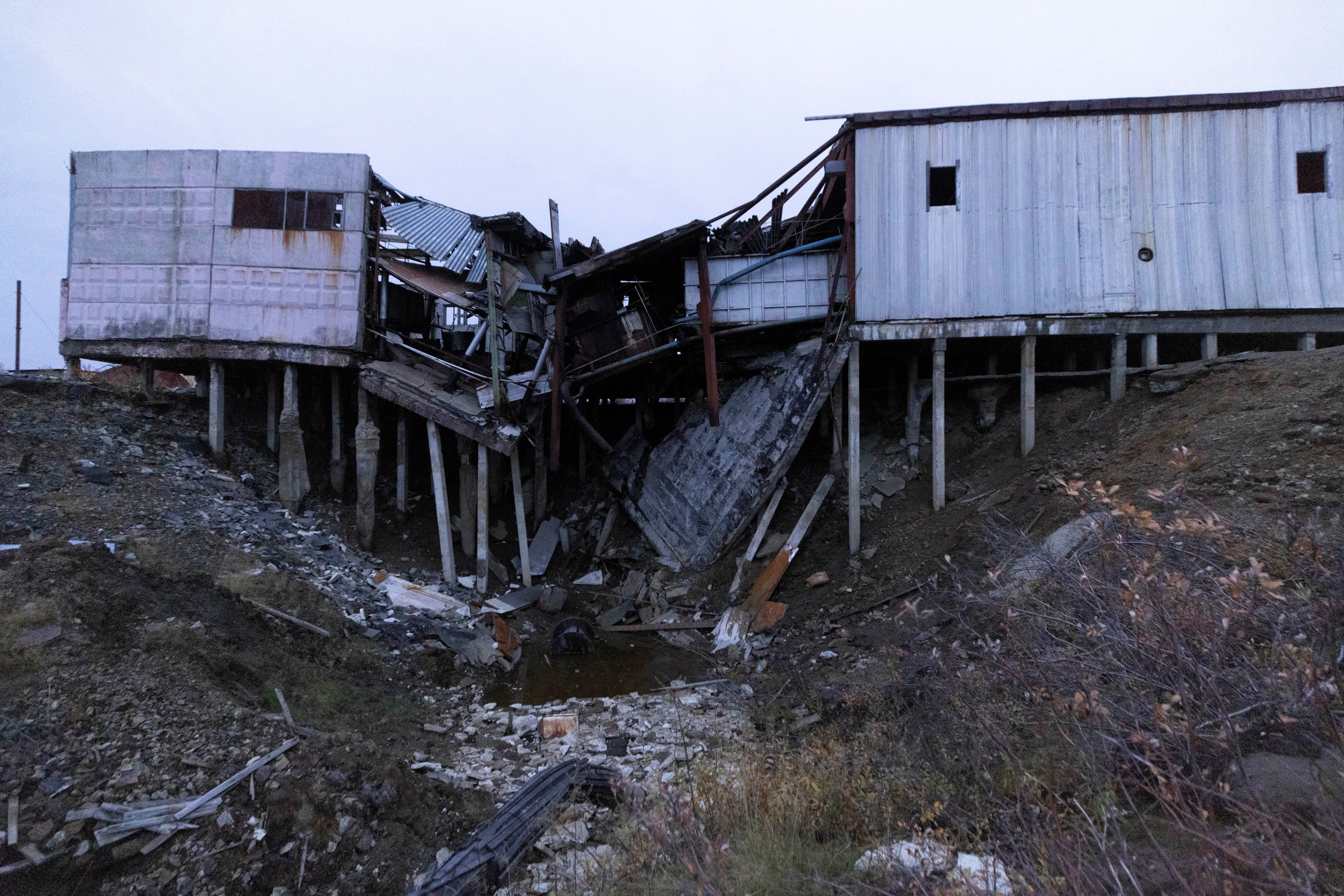 An industrial building that was destroyed when the permafrost thawed under its foundation