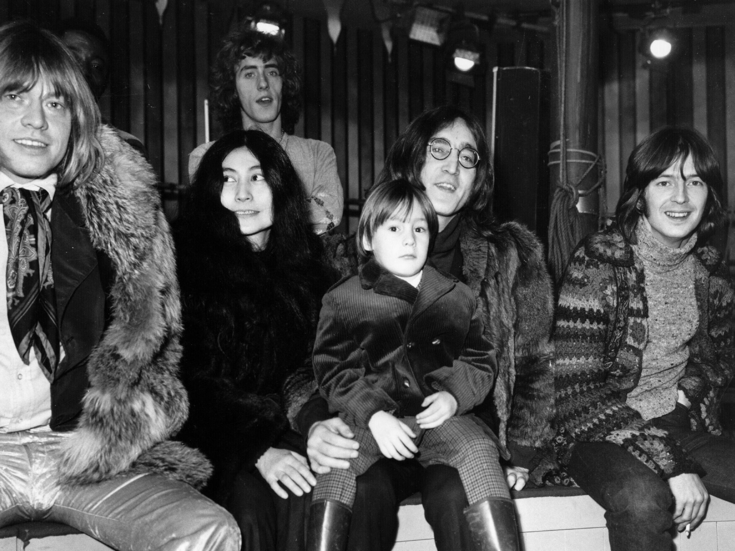 Left to right: Rolling Stones guitarist Brian Jones, Yoko Ono and John Lennon with son Julian, Eric Clapton, and behind them Roger Daltrey