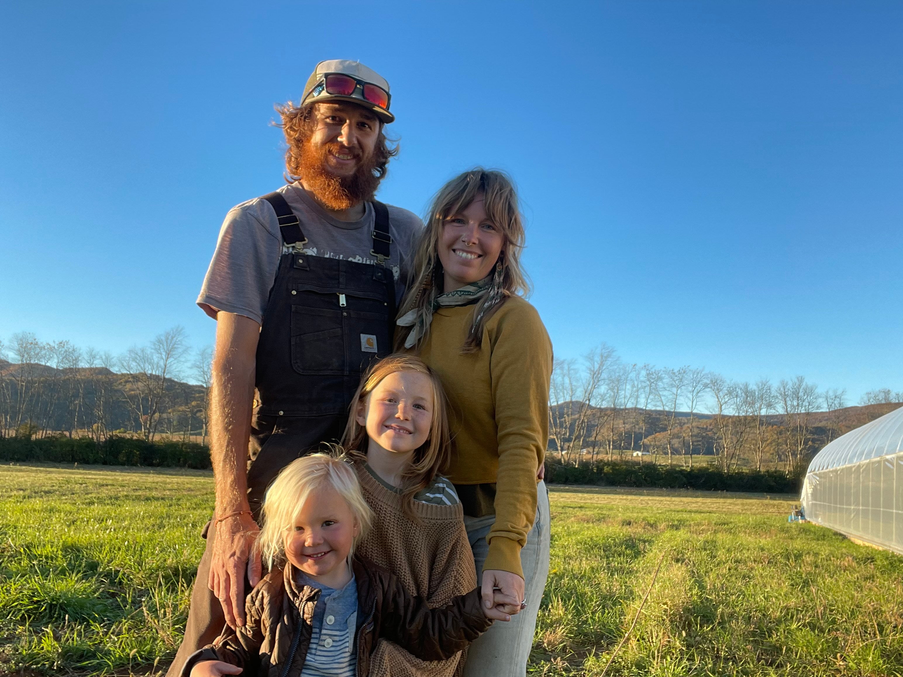 Holly Bradley with her husband and children, Elan and Arlo, pictured near their home in Hillsboro, West Virginia