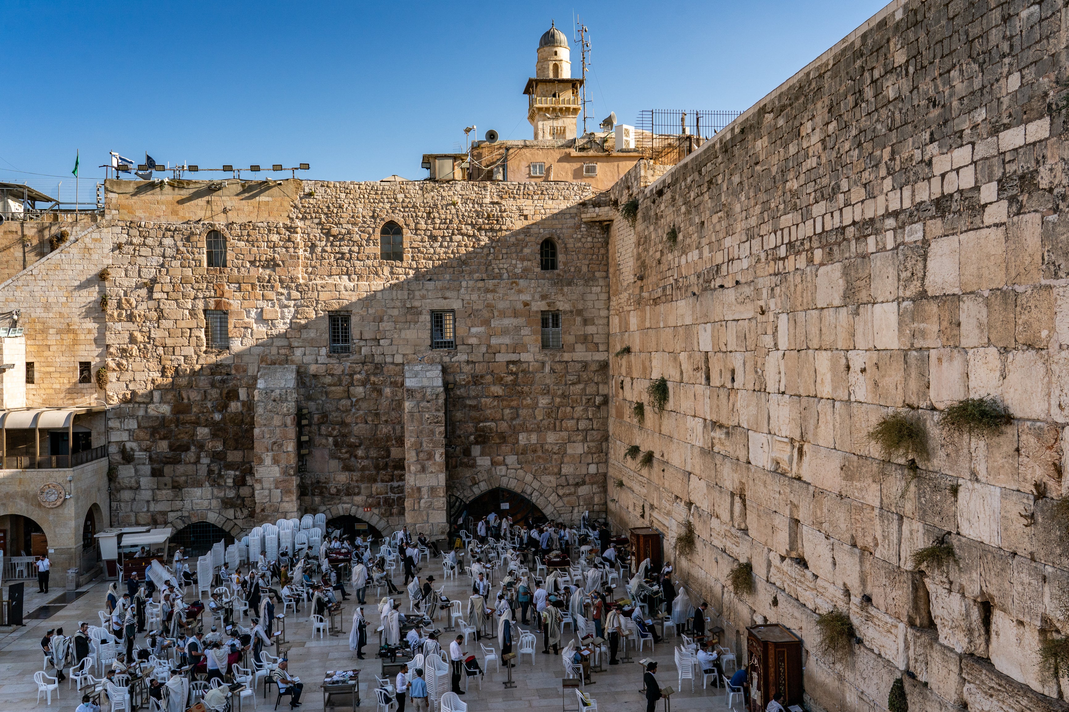 Jewish worshippers pray at the Western Wall in the Old City of Jerusalem