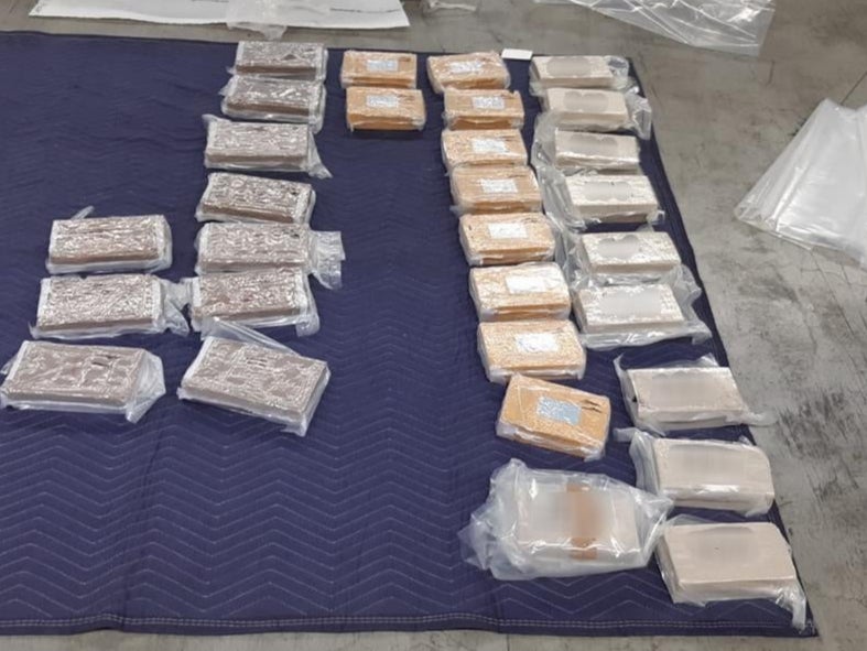 A total of 20.5 kilos of heroin, 32 kilos of cocaine and three kilos of MDMA were found