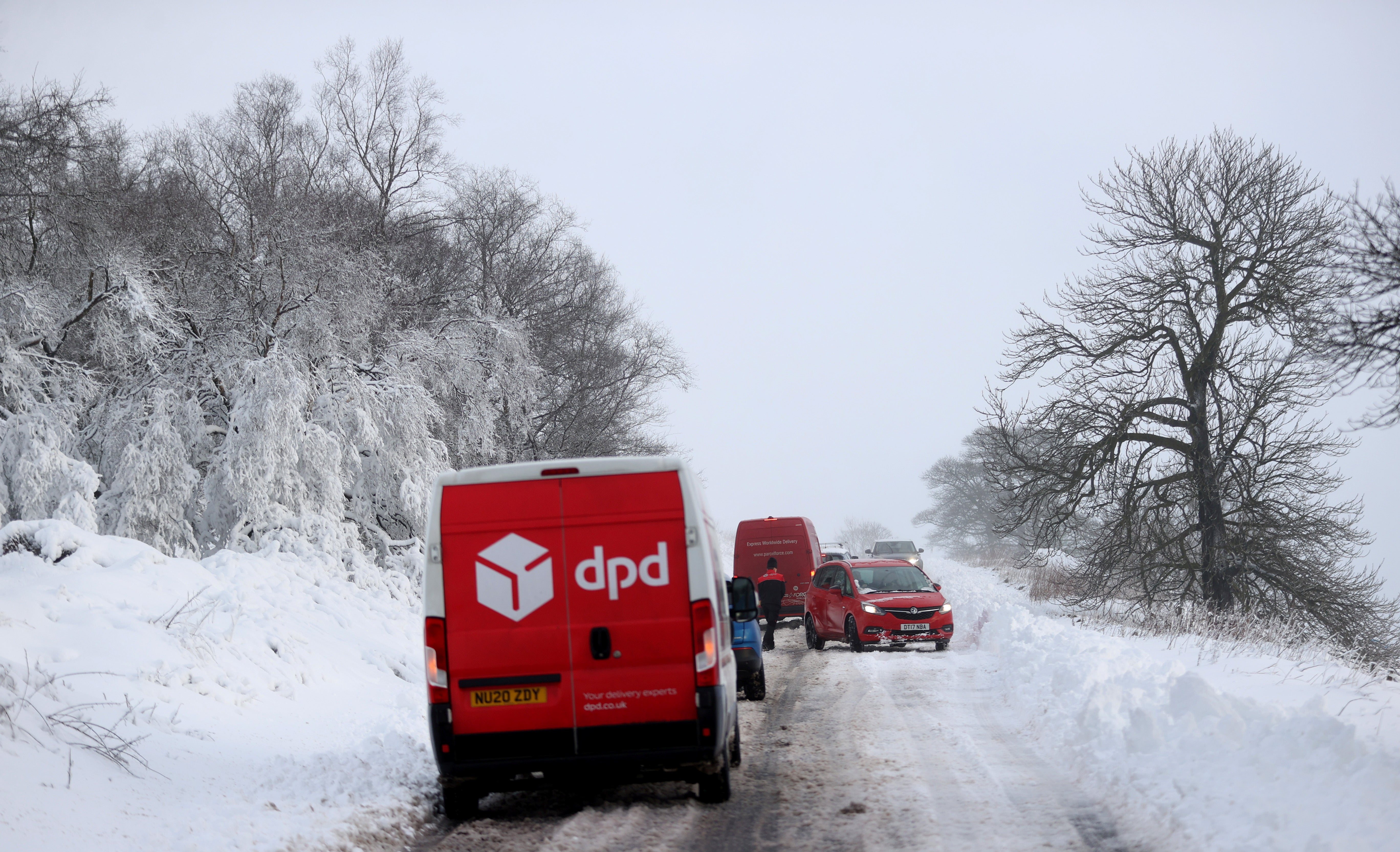 Cars stuck in snow that fell overnight in Leek, Staffordshire