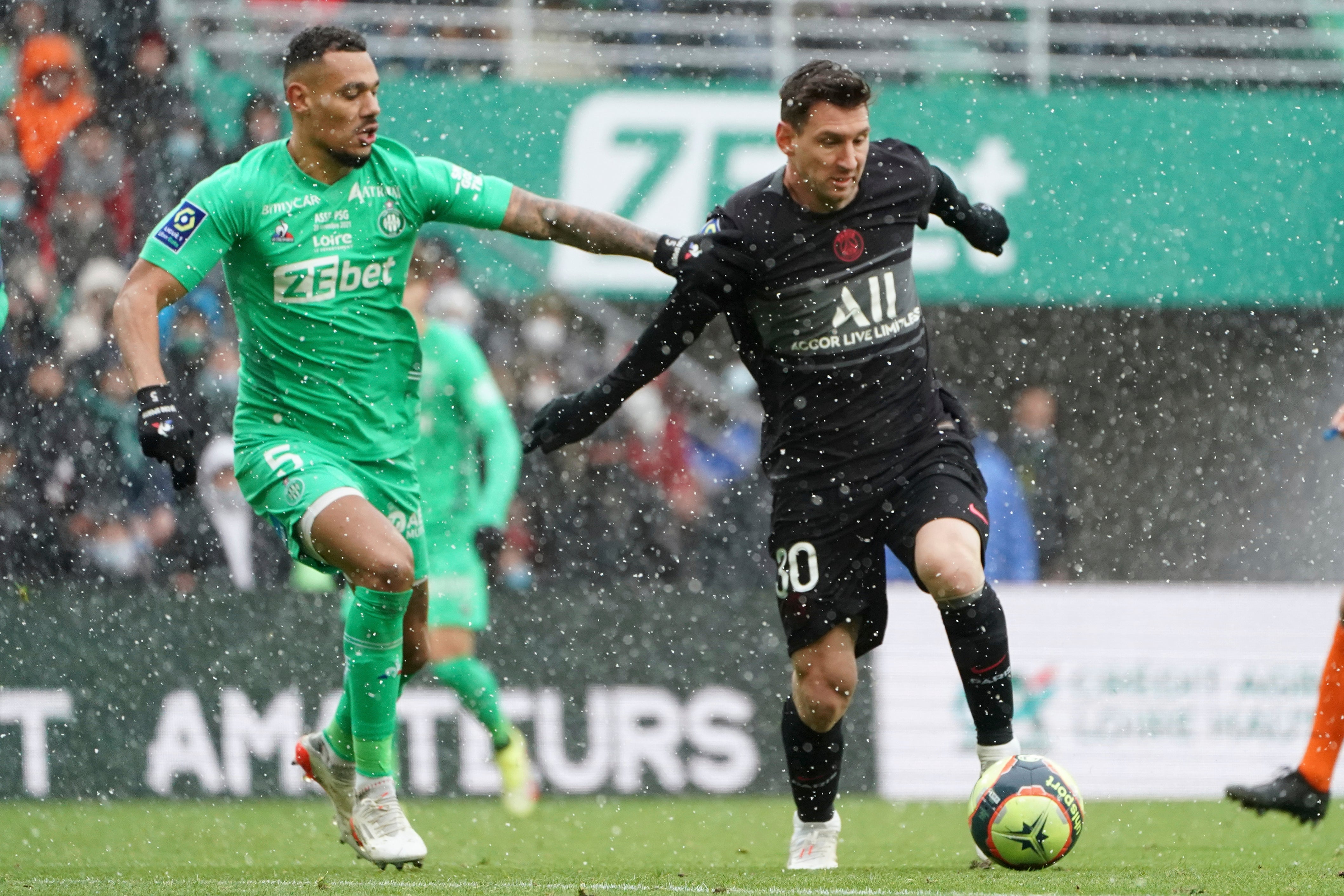 Lionel Messi (right) helped Paris St Germain come from behind to win at Saint-Etienne (Laurent Cipriani/AP)