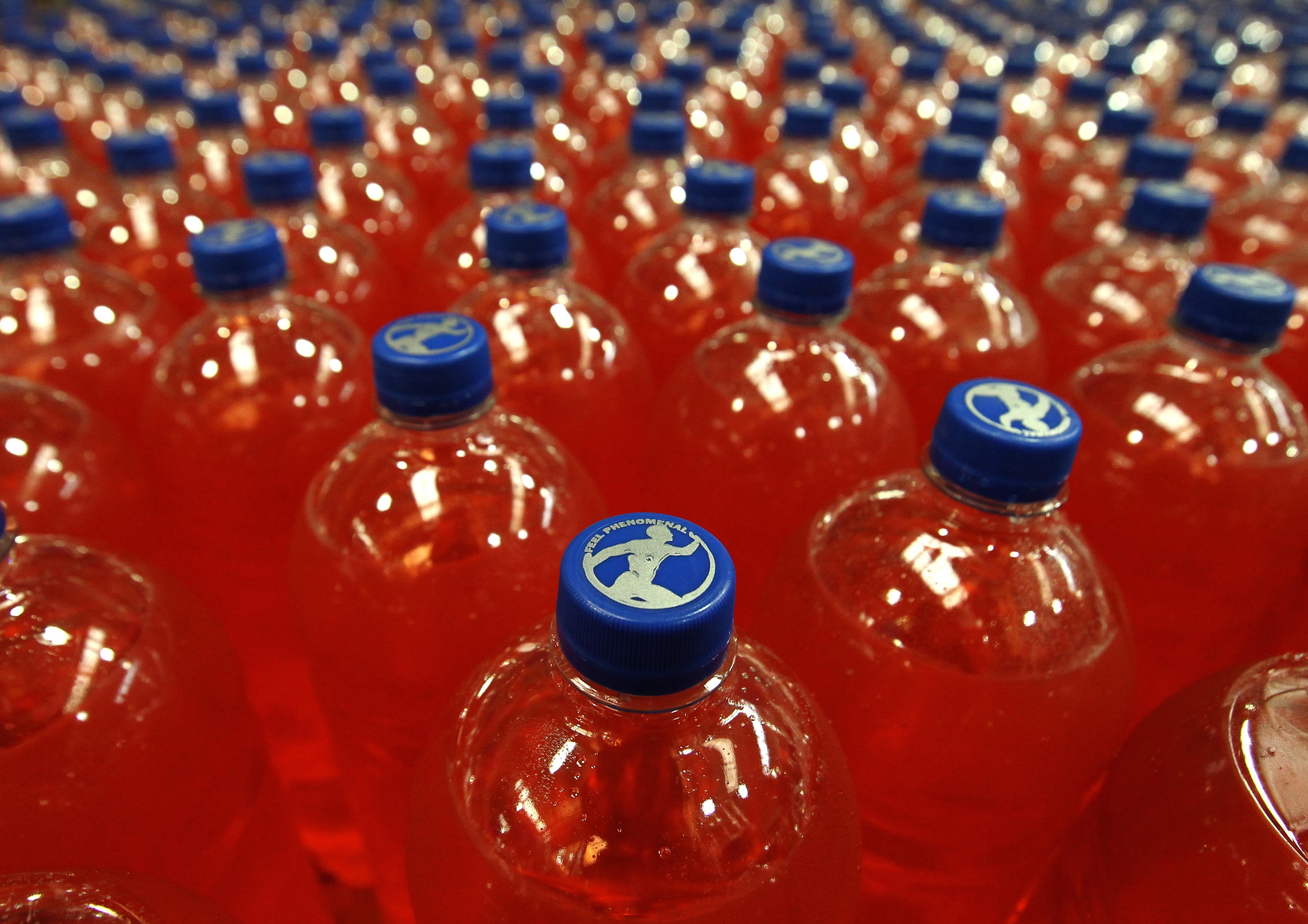 Bottles of Irn Bru in the production hall at AG Barr’s factory in Cumbernauld (Andrew Milligan/PA)