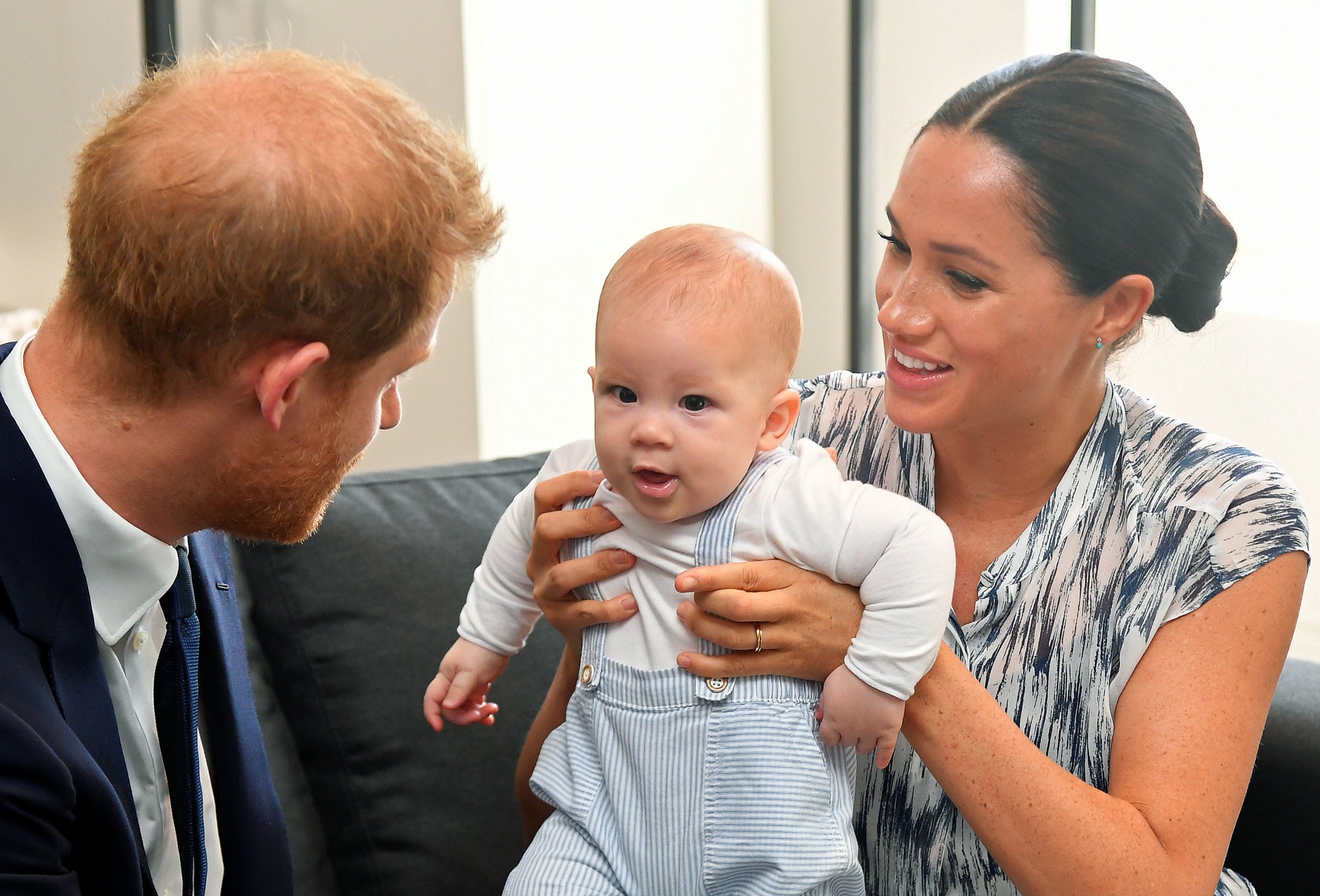 File photo dated 25/09/2019 of the Duke and Duchess of Sussex holding their son Archie during a meeting with Archbishop Desmond Tutu. The Duchess of Sussex gave birth to a 7lb 11oz daughter, Lilibet “Lili” Diana Mountbatten-Windsor, on Friday in California and both mother and child are healthy and well, Meghan’s press secretary said. (PA)