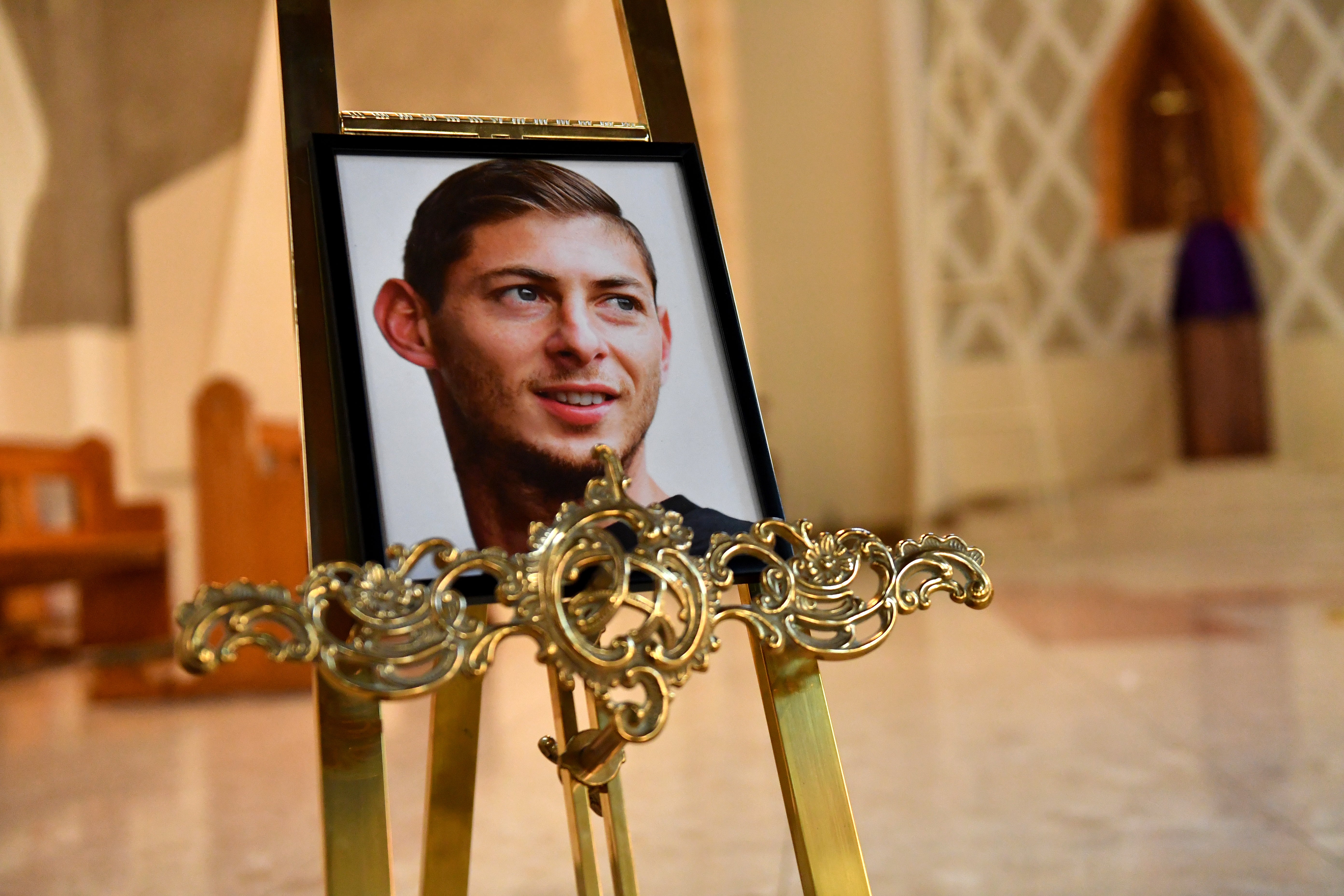 A portrait of Emiliano Sala is displayed at the front of St David’s Cathedral, Cardiff (Jacob King/PA)