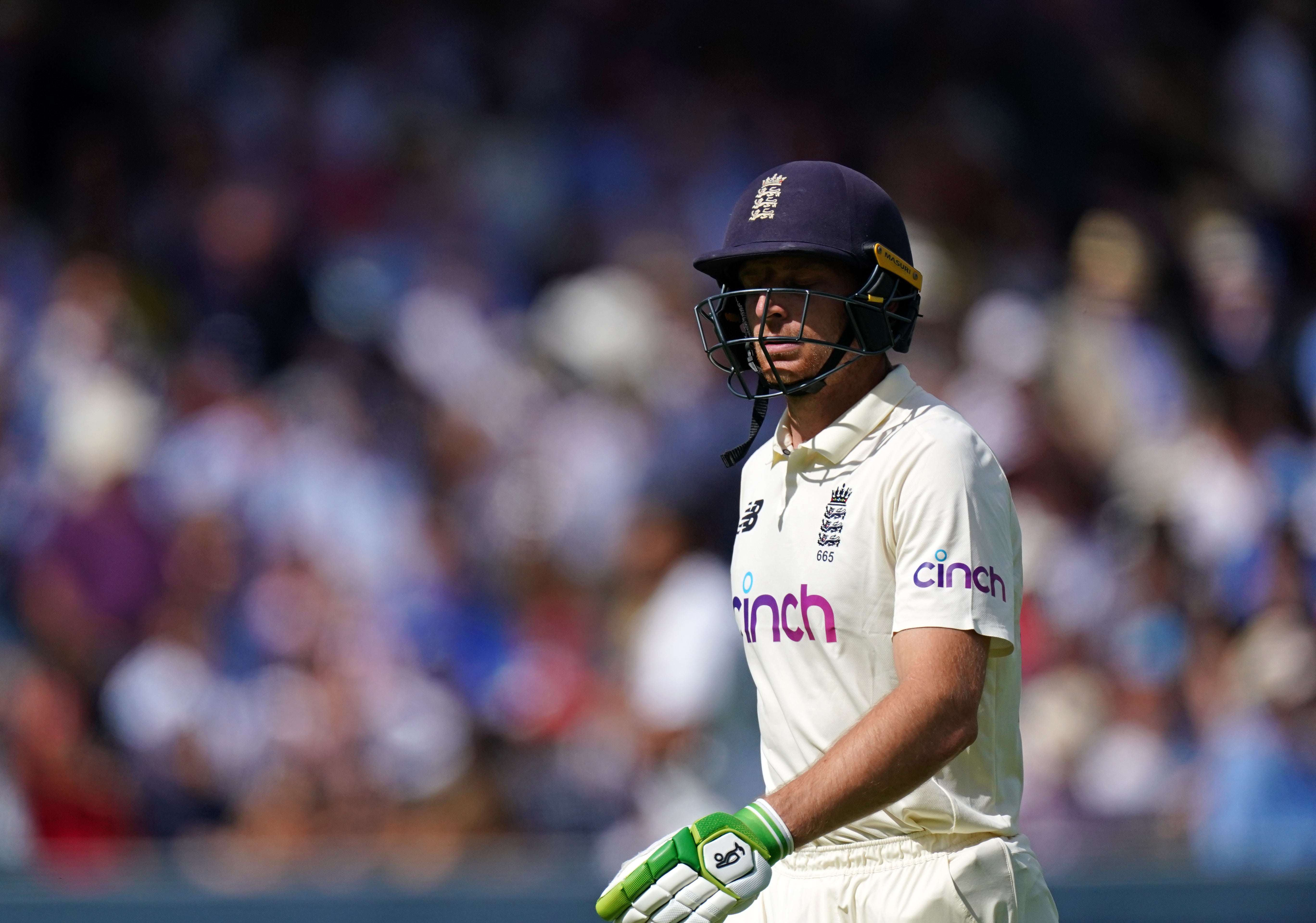 England’s Jos Buttler walks off after losing his wicket (Zac Goodwin/PA)