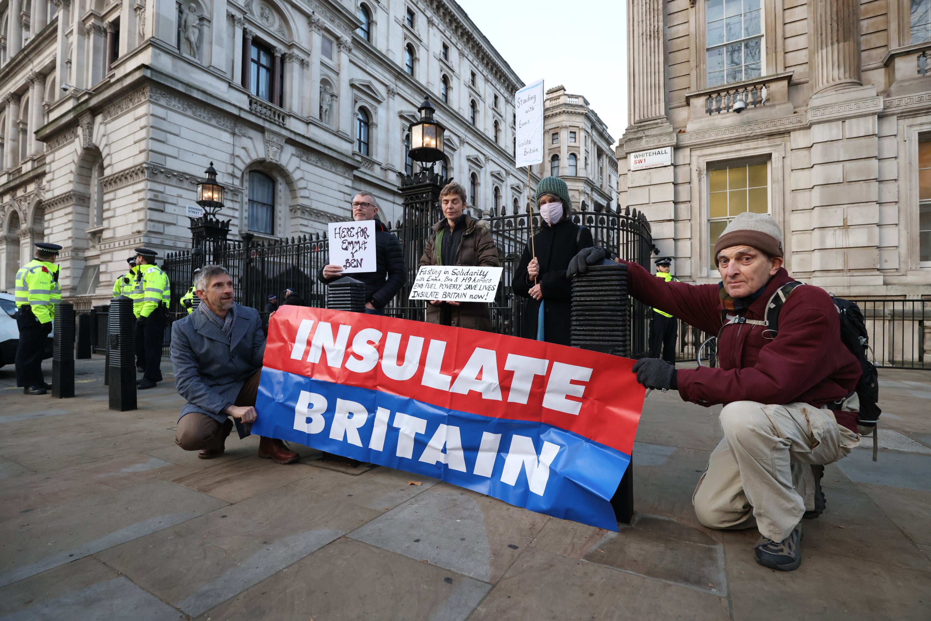 Supporters of Insulate Britain stage a 24-hour fast outside Downing Street in a call for action on fuel poverty (James Manning/PA)