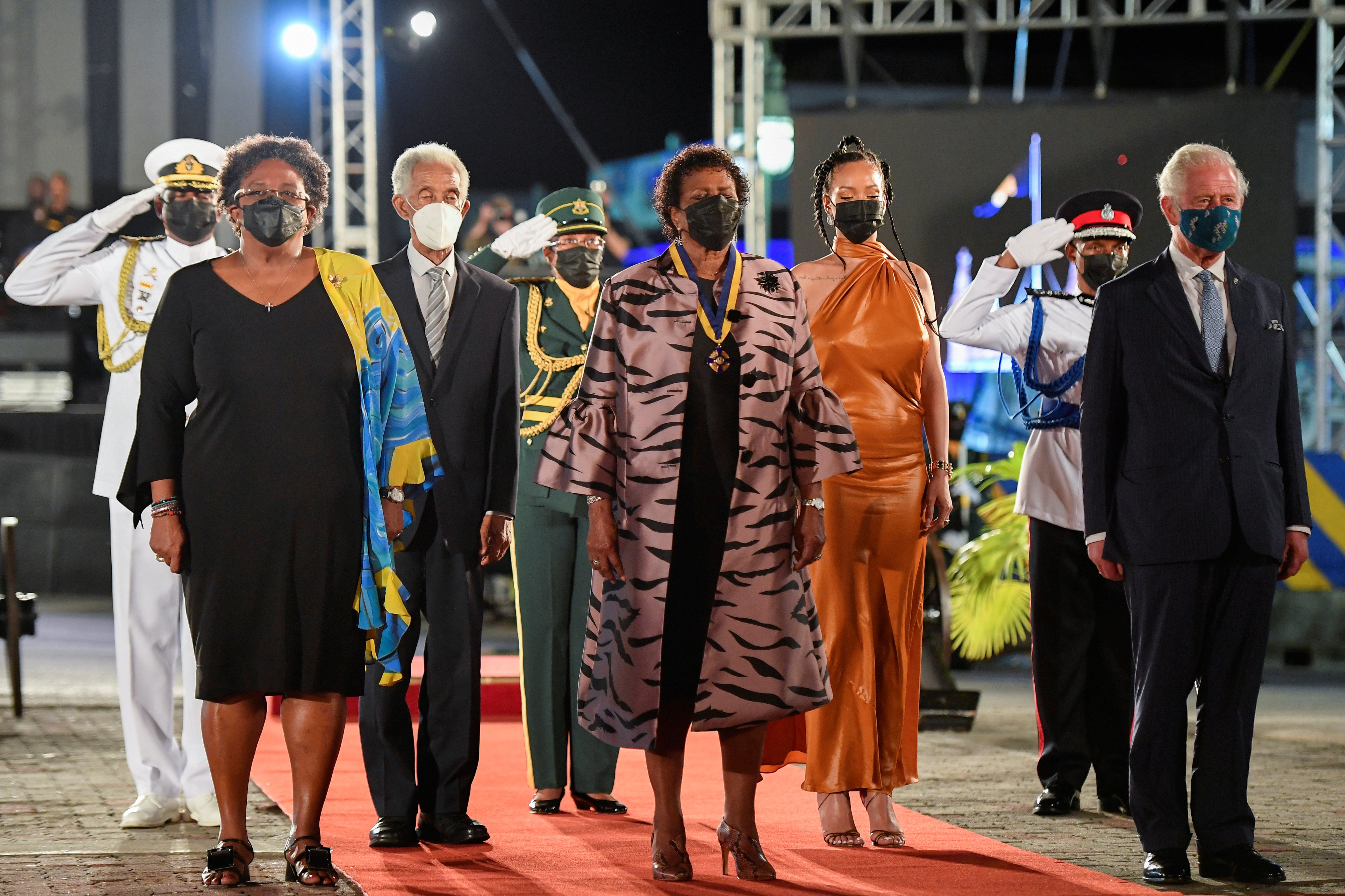 The prime minister of Barbados, Mia Mottley, cricket legend Sir Garfield Sobers, the president of Barbados, Dame Sandra Mason, Rihanna, and Prince Charles attend the presidential inauguration ceremony at Heroes Square on 30 November in Bridgetown