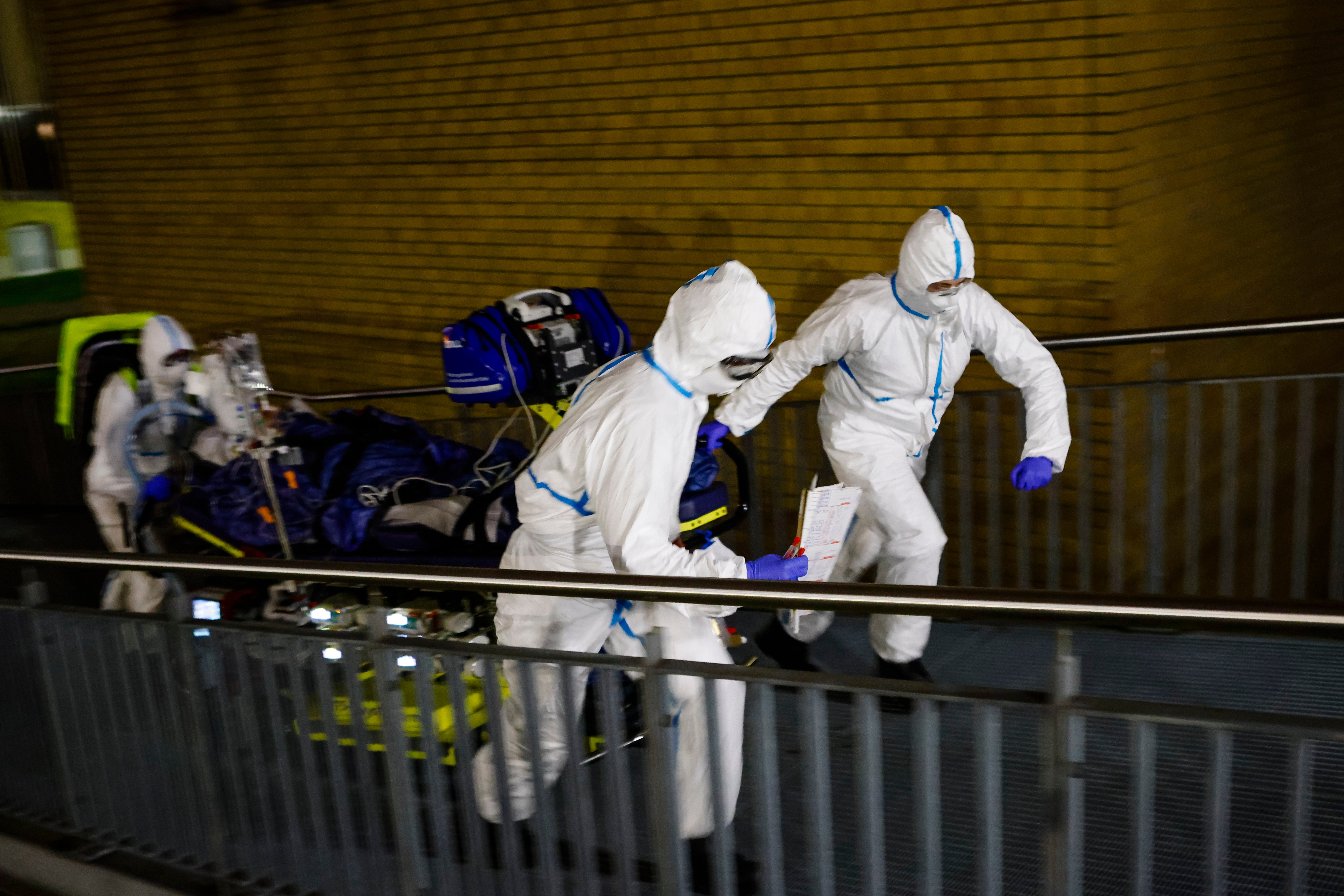 Paramedics arrive with a Covid-19 patient at the Kiel University Hospital