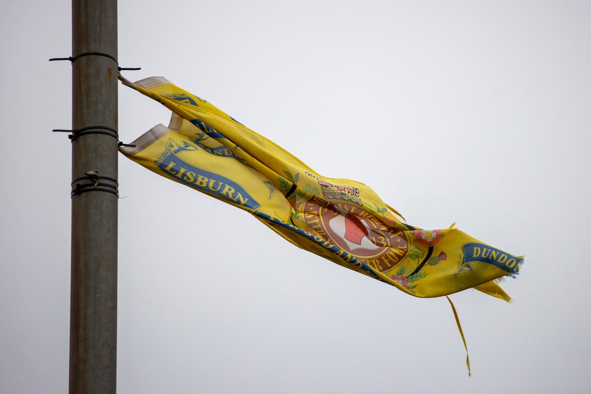 A South Belfast Regiment Ulster Volunteer Force 1913 flag flies on a lamppost in the loyalist area of The Village in south Belfast (Liam McBurney/PA)