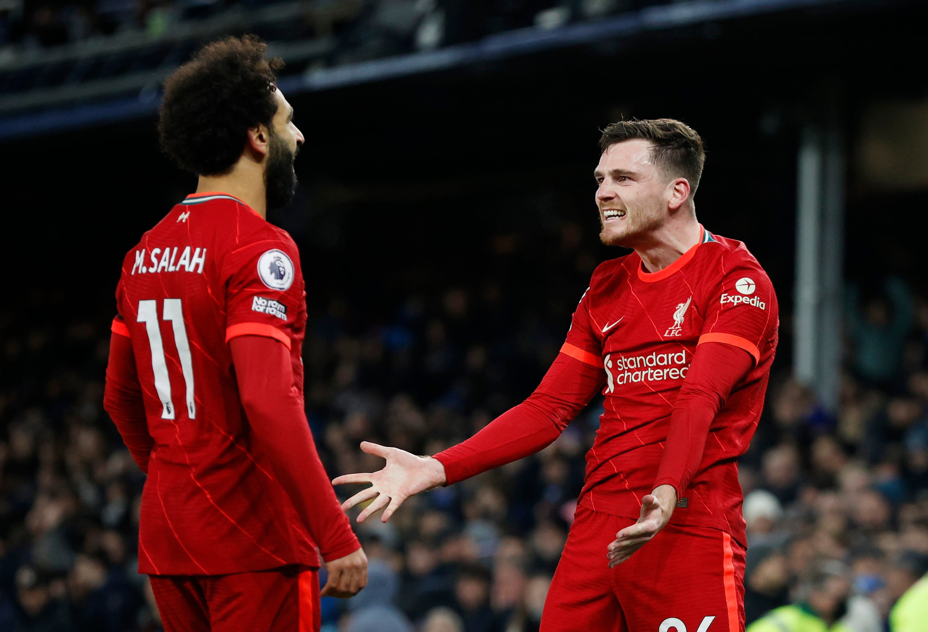 Mohamed Salah celebrates with Andy Robertson