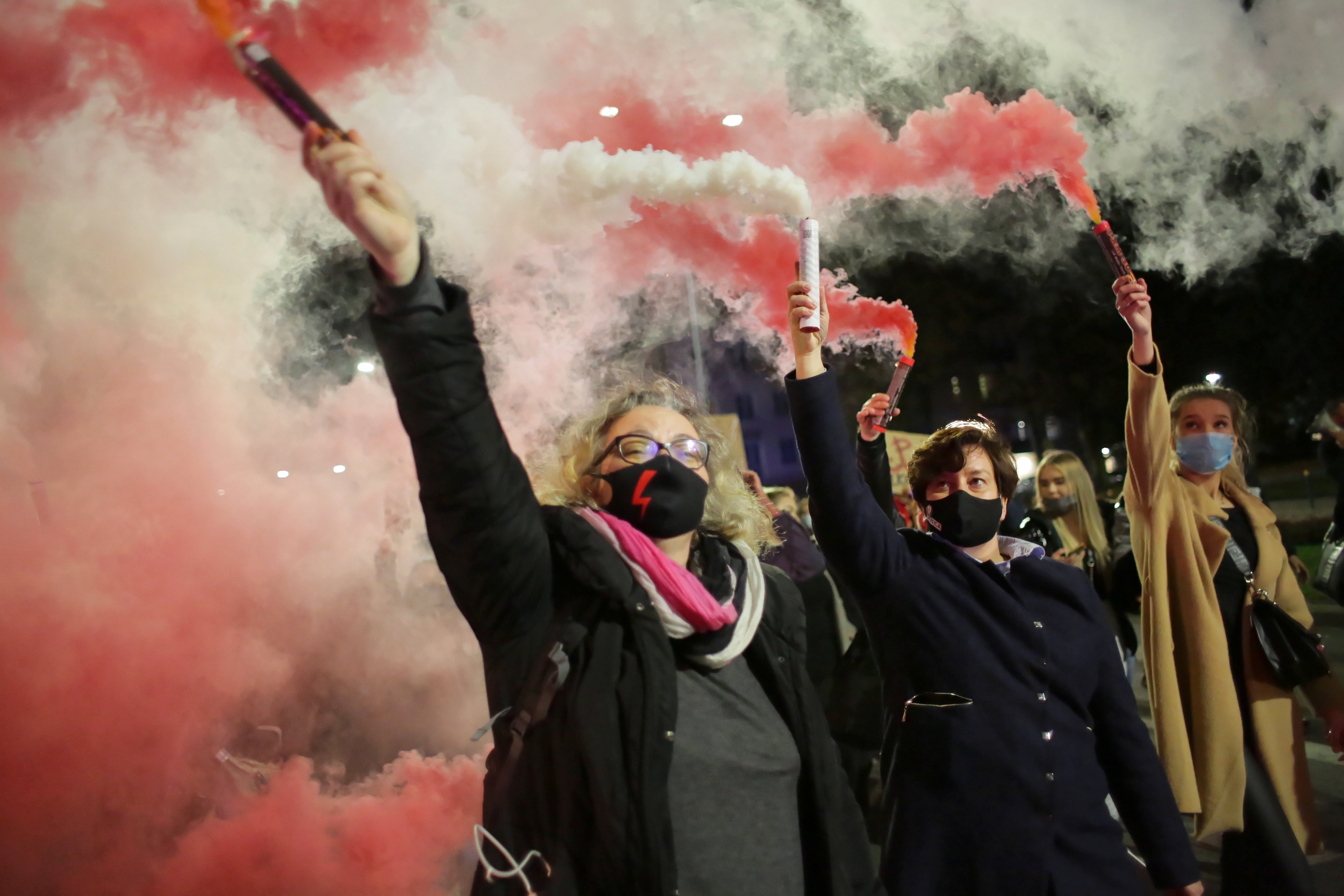 Activist leader Marta Lempart (left) and lawmaker Monika Falej (centre) protest against the tightening of the abortion law