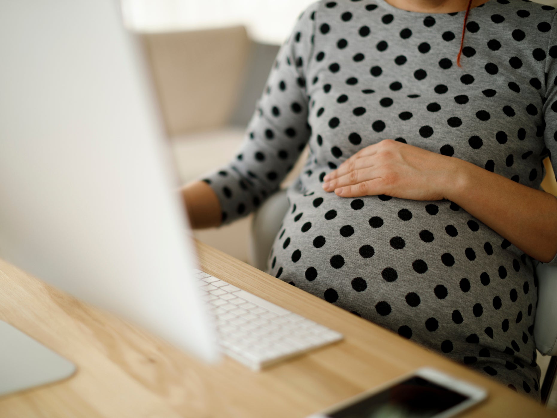 A pregnant woman at work