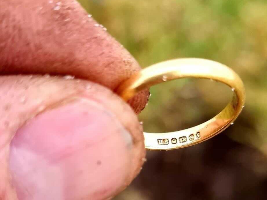 Donald MacPhee holds up Peggy MacSween’s ring that he found with a metal detector, 50 years after she lost it in a potato patch